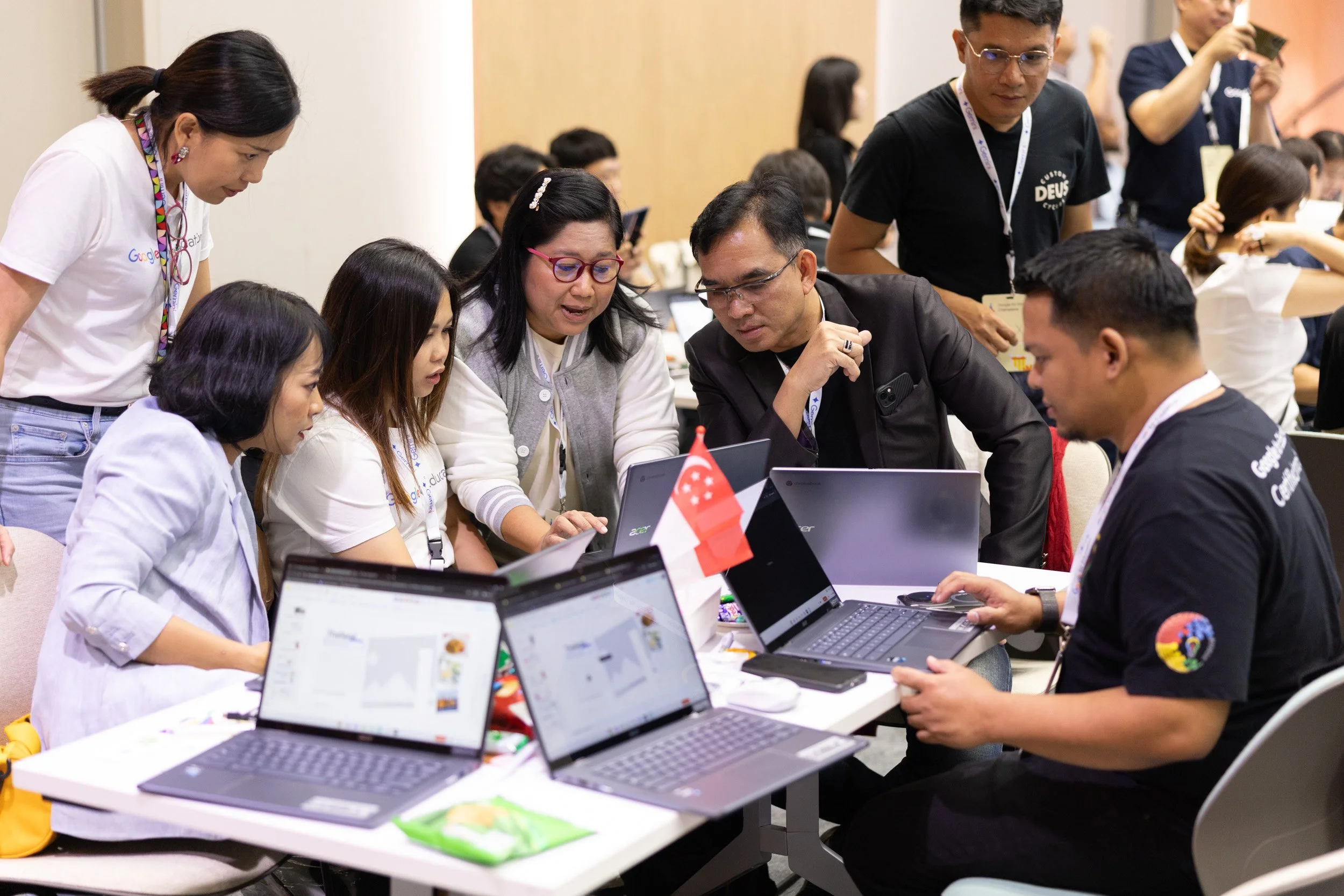  Candid image of conference delegates networking and sharing EdTech ideas. 