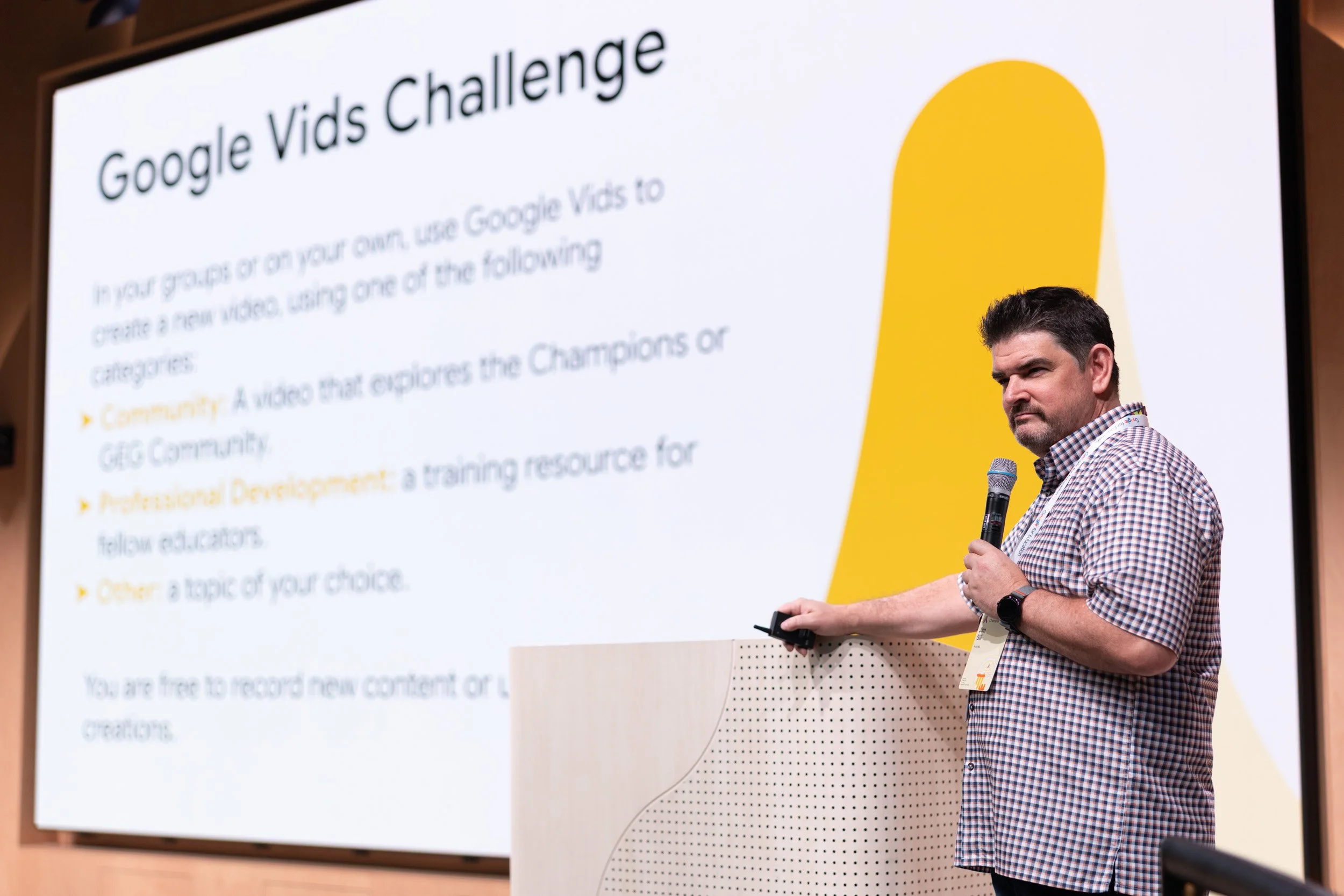  Close-up photograph of keynote speaker Jim Sill presenting at Google HQ. 