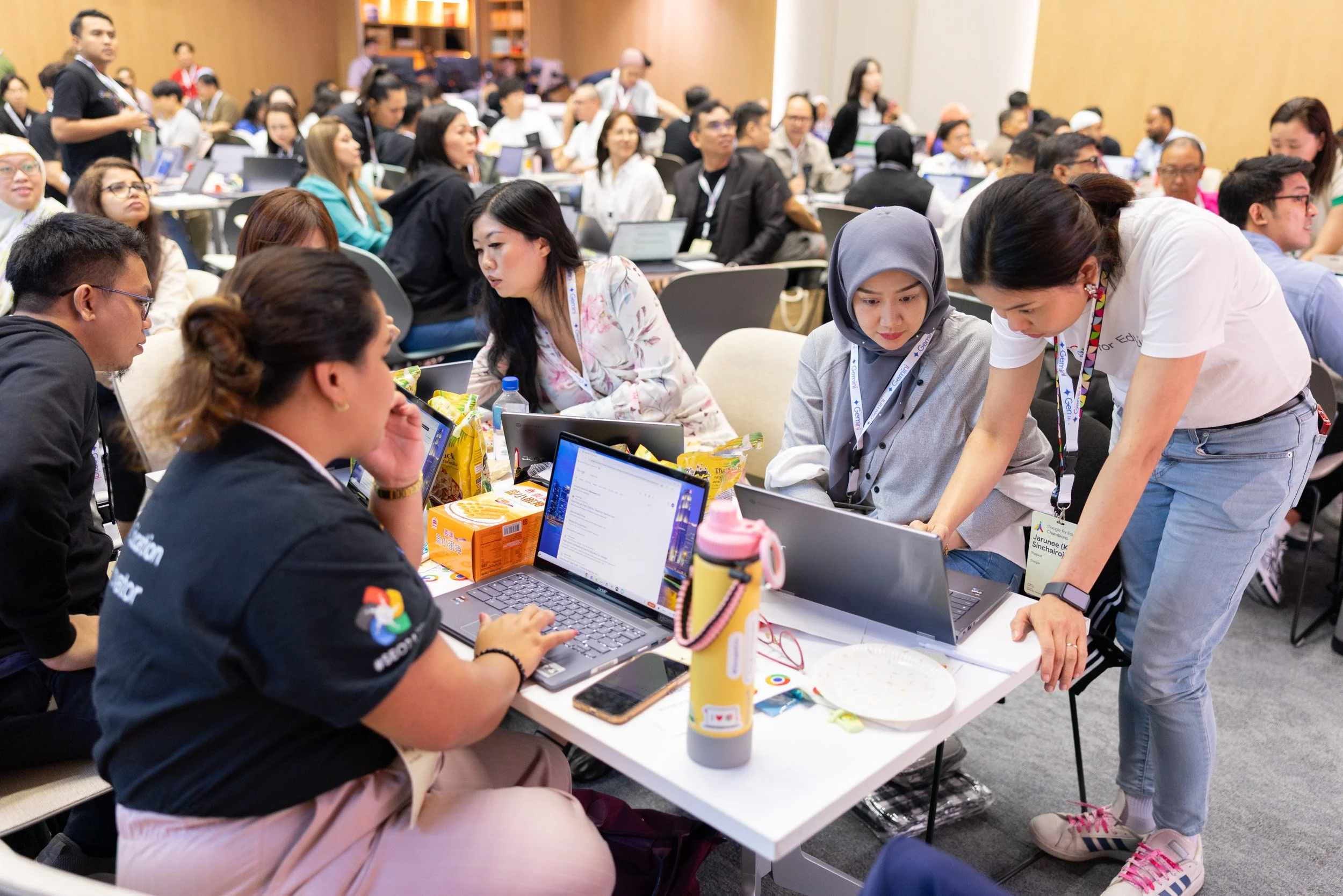  Attendees participating in round-table discussions during a breakout session. 