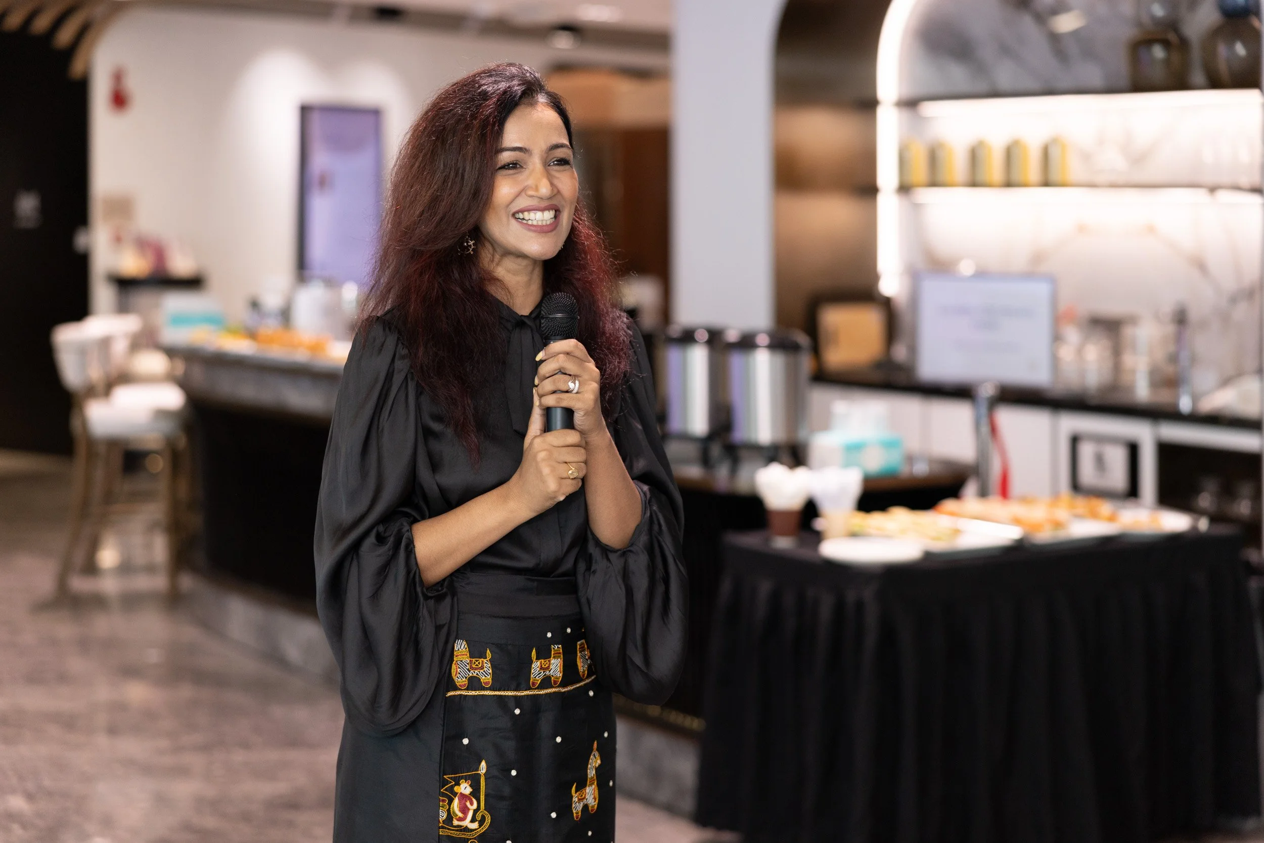  Close-up portrait of Bhavna Toor presenting key insights on mindful leadership. 