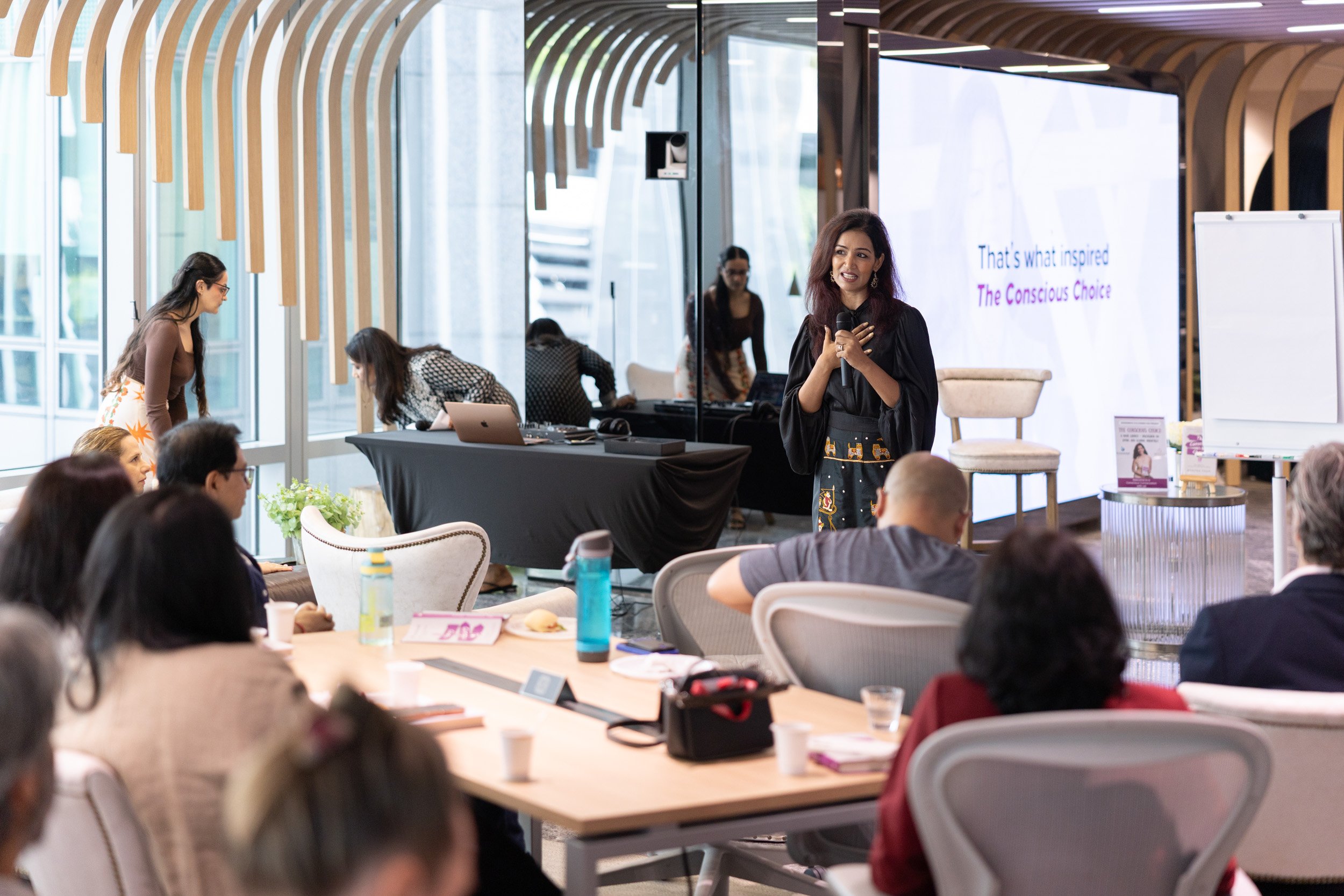  Medium shot of Bhavna Toor delivering her book presentation on conscious leadership. 