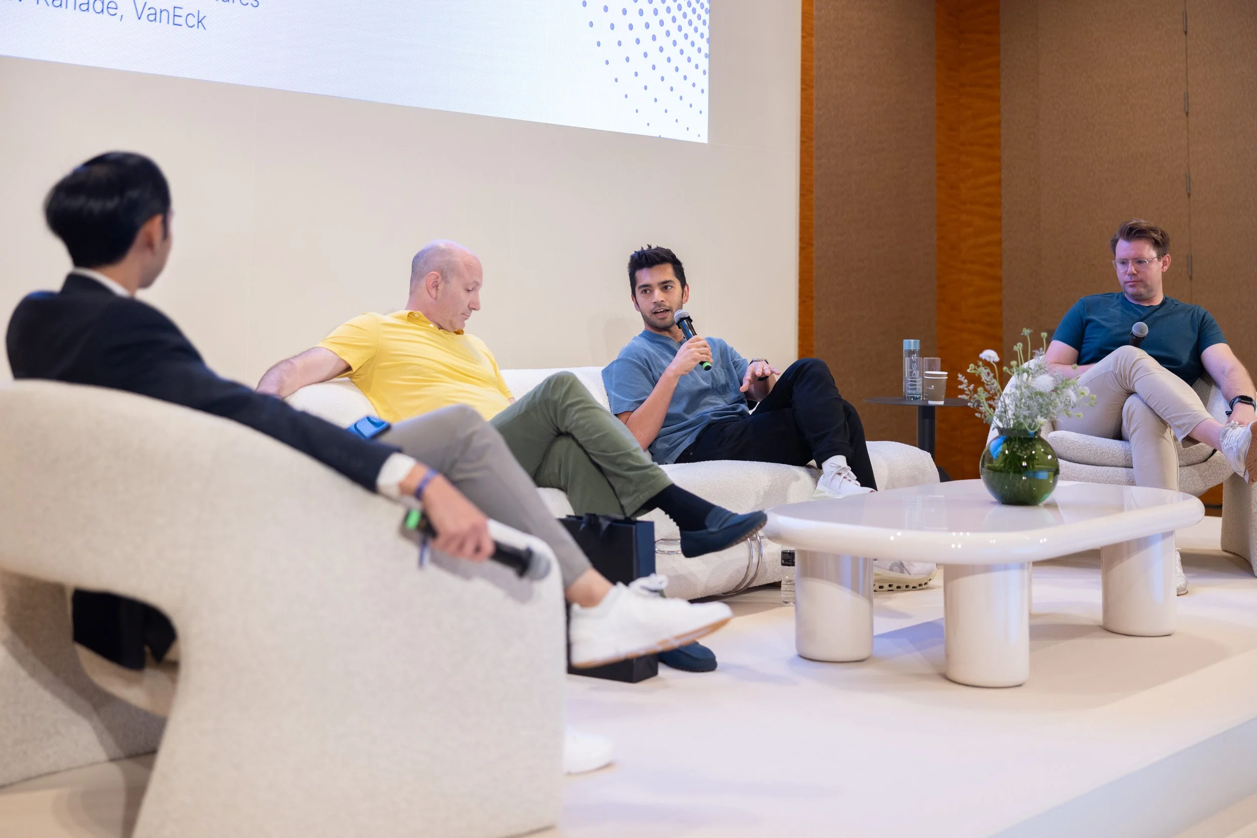  Panelists Seth Ginns, Carl Vogel, and Pranav Kanade responding to questions during David Duong's moderated session. 