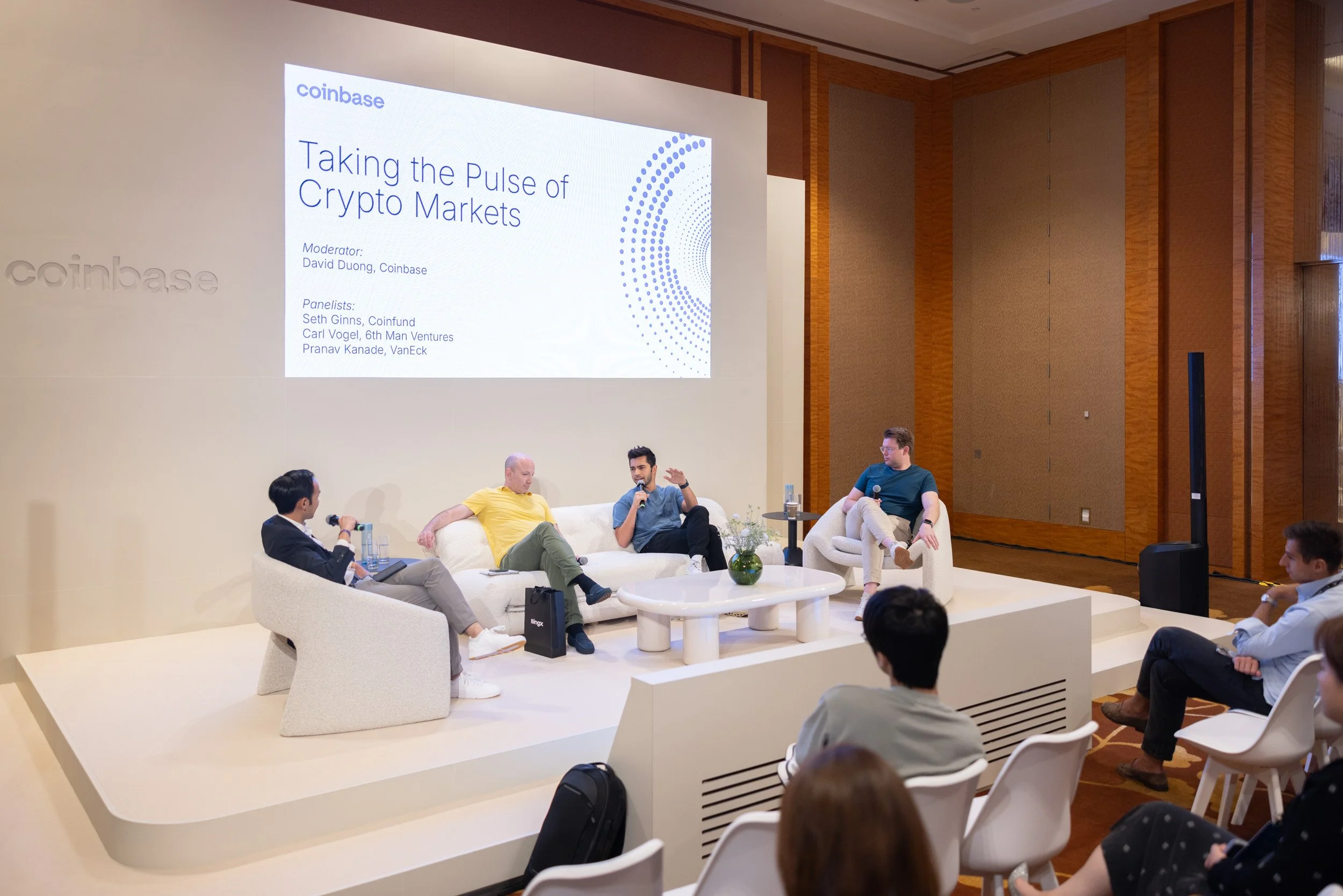  Medium panel discussion photo featuring Seth Ginns, Carl Vogel, Pranav Kanade, and David Duong on stage. 