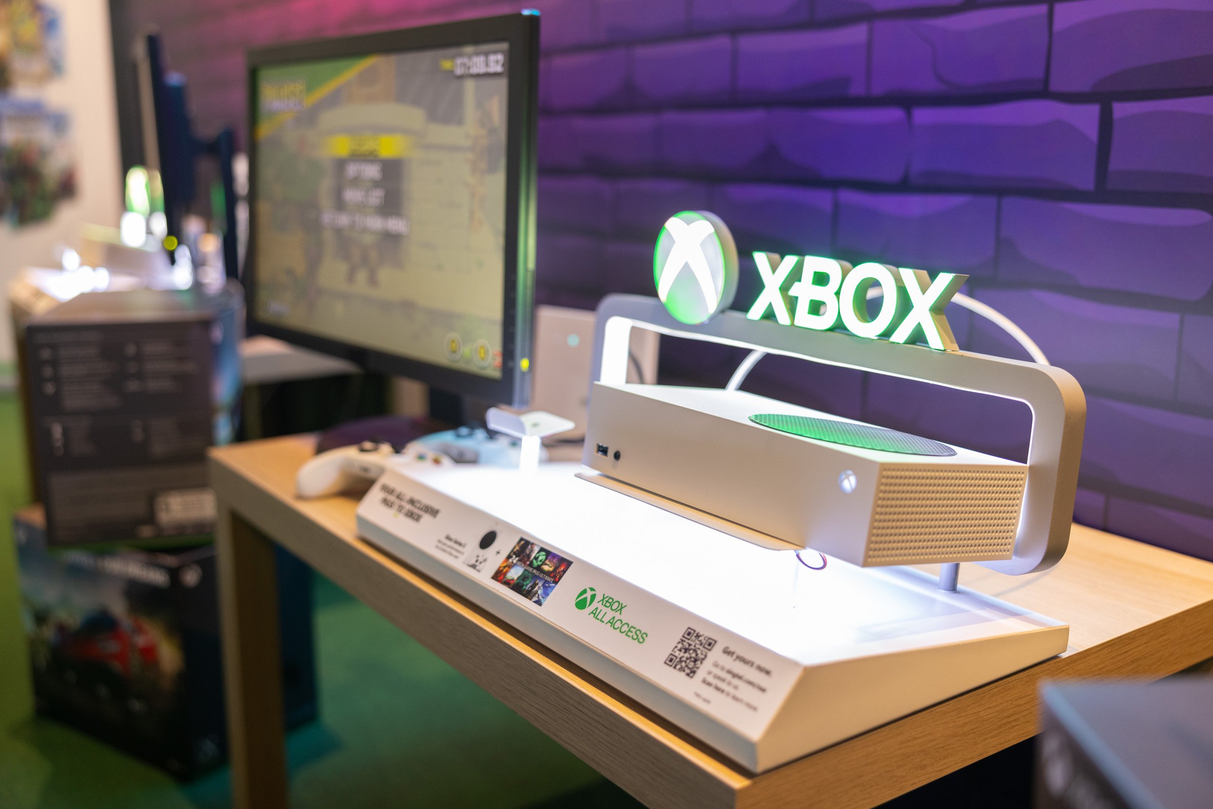  Close-up photo of an Xbox gaming console set up for interactive gameplay at the venue. 