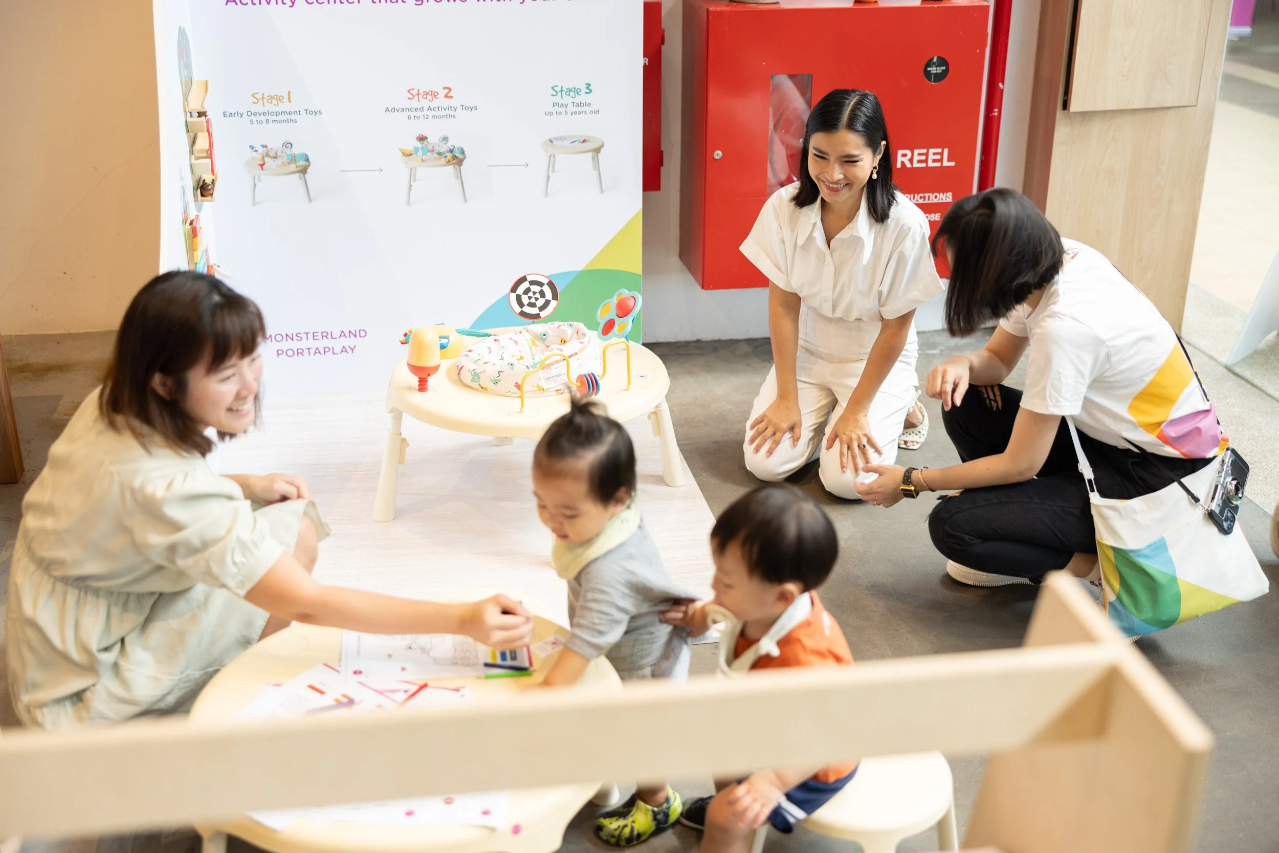  Local mothers and toddlers testing out Oribel developmental toys during the tea party. 
