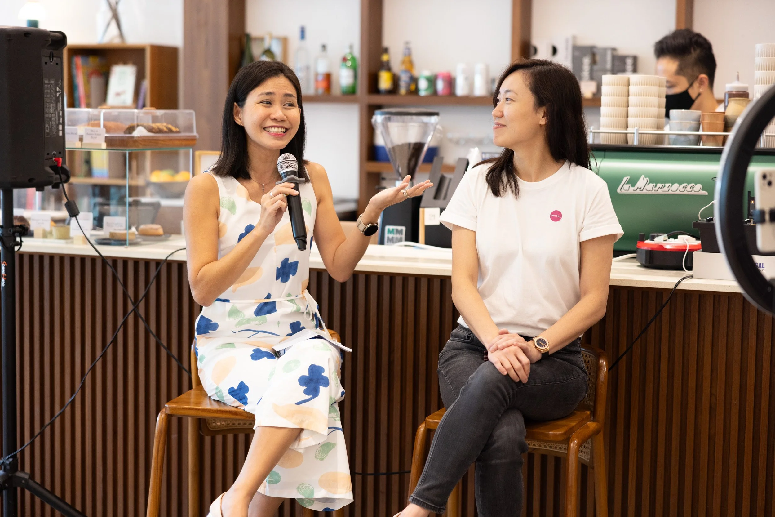  Panel speakers Cindy Goh and Dr. May Sok Mui Lim discussing child development during the Q&amp;A. 