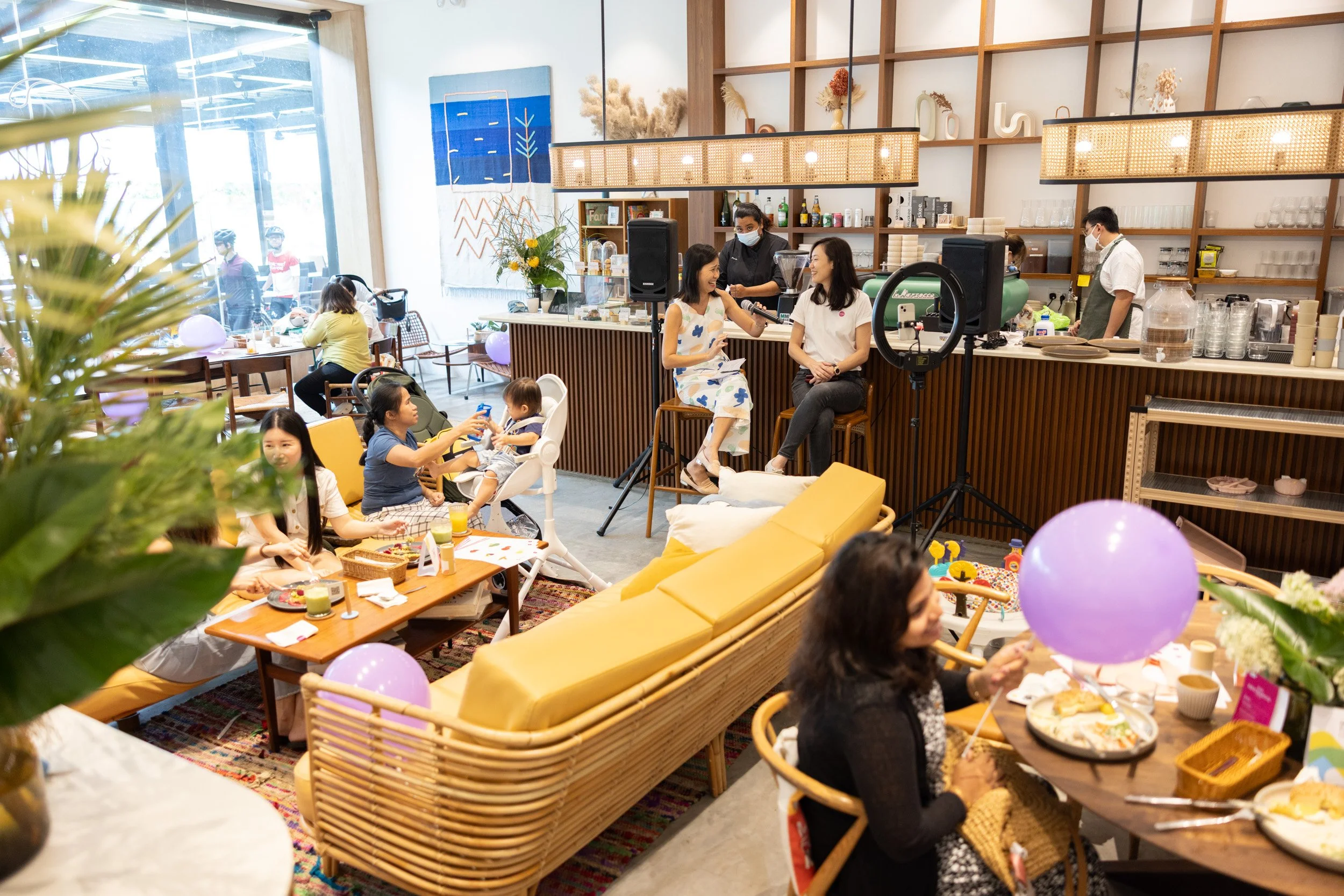  Wide-angle view of the parenting panel discussion stage with Cindy Goh and Dr. May Sok Mui Lim. 