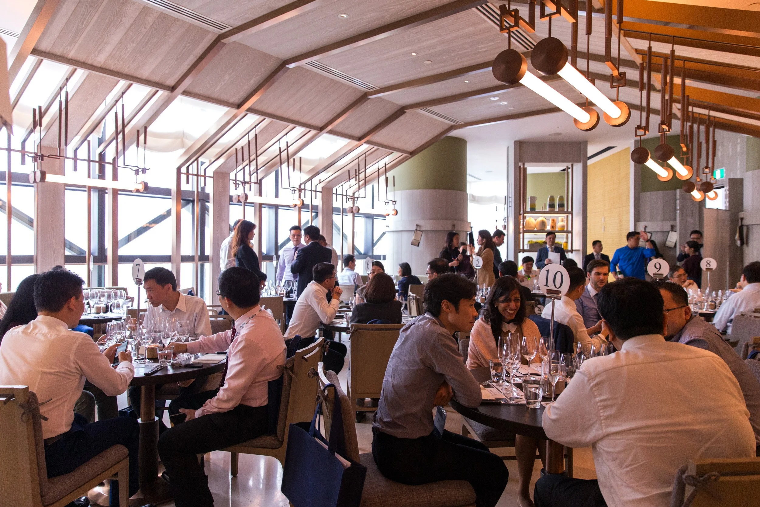  Wide interior view of the dining venue filled with guests for the Columbia Threadneedle conference dinner. 