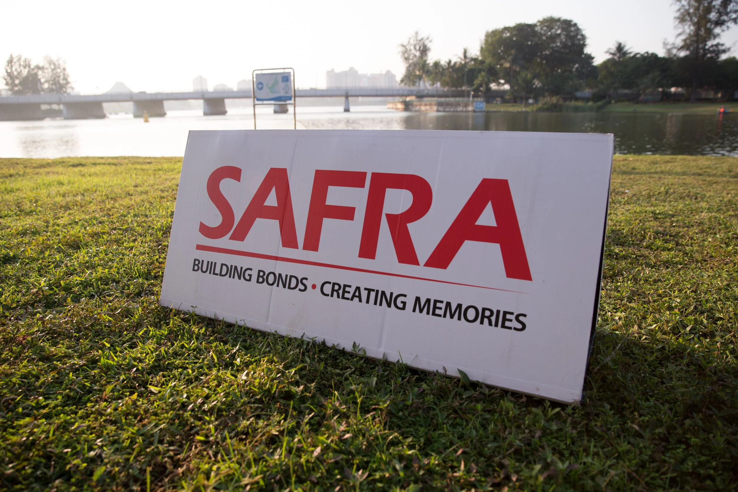  Event backdrop display reading "SAFRA Building Bonds - Creating Memories" for the Singapore Artillery team cohesion session. 