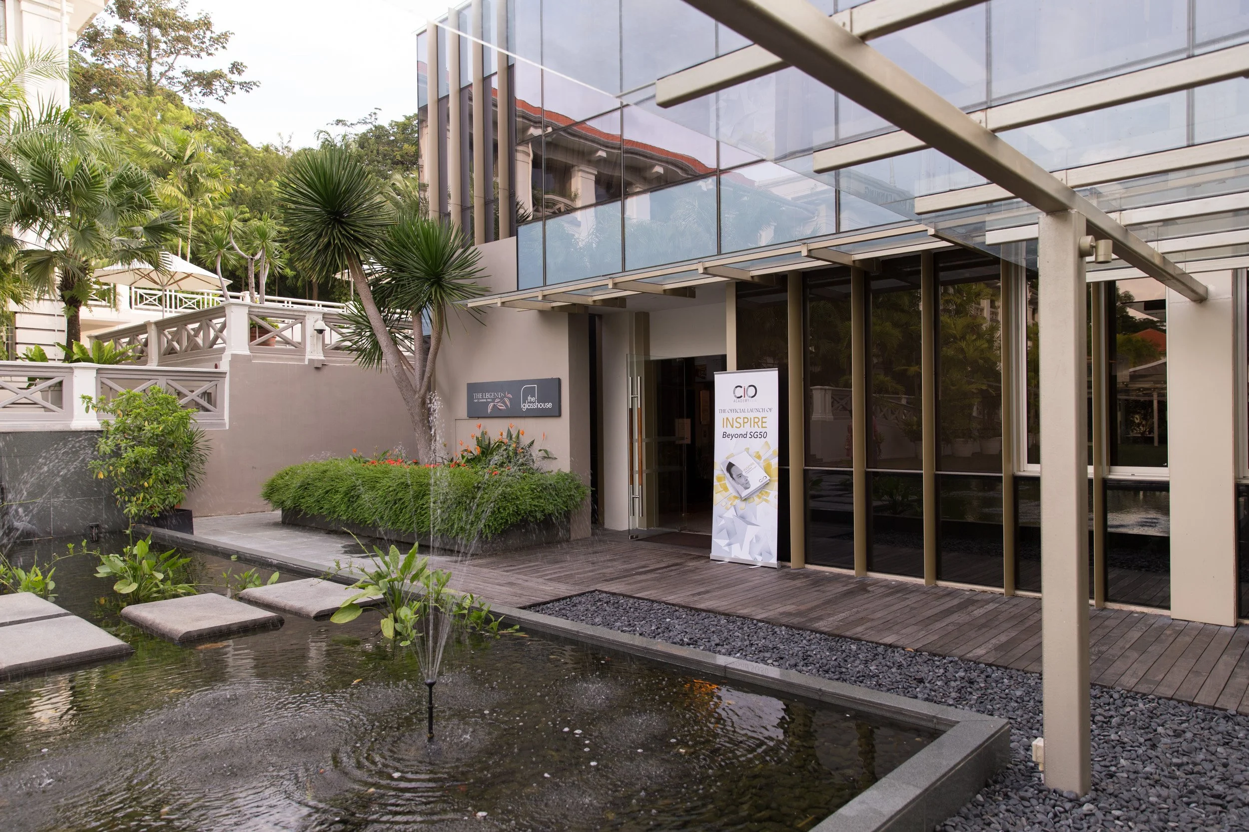  Wide-angle view of the exterior entryway to The Glasshouse setup for the CIO Academy Asia book launch. 