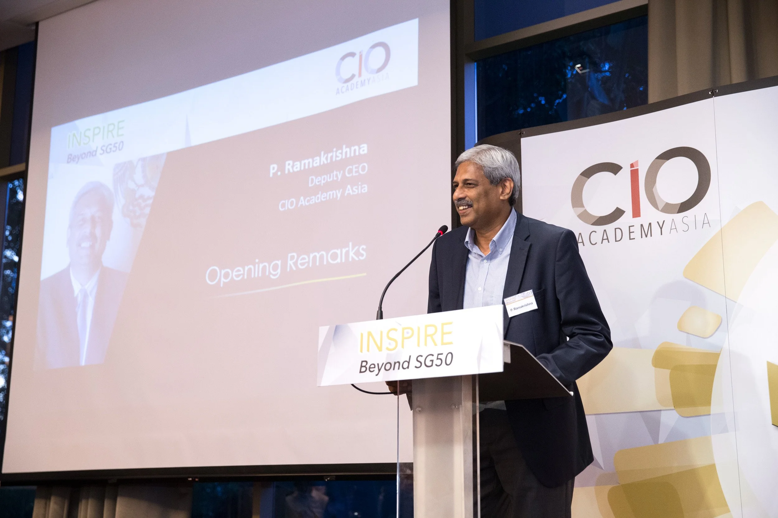  P. Ramakrishna, Deputy CEO of CIO Academy Asia, delivering opening remarks on stage. 