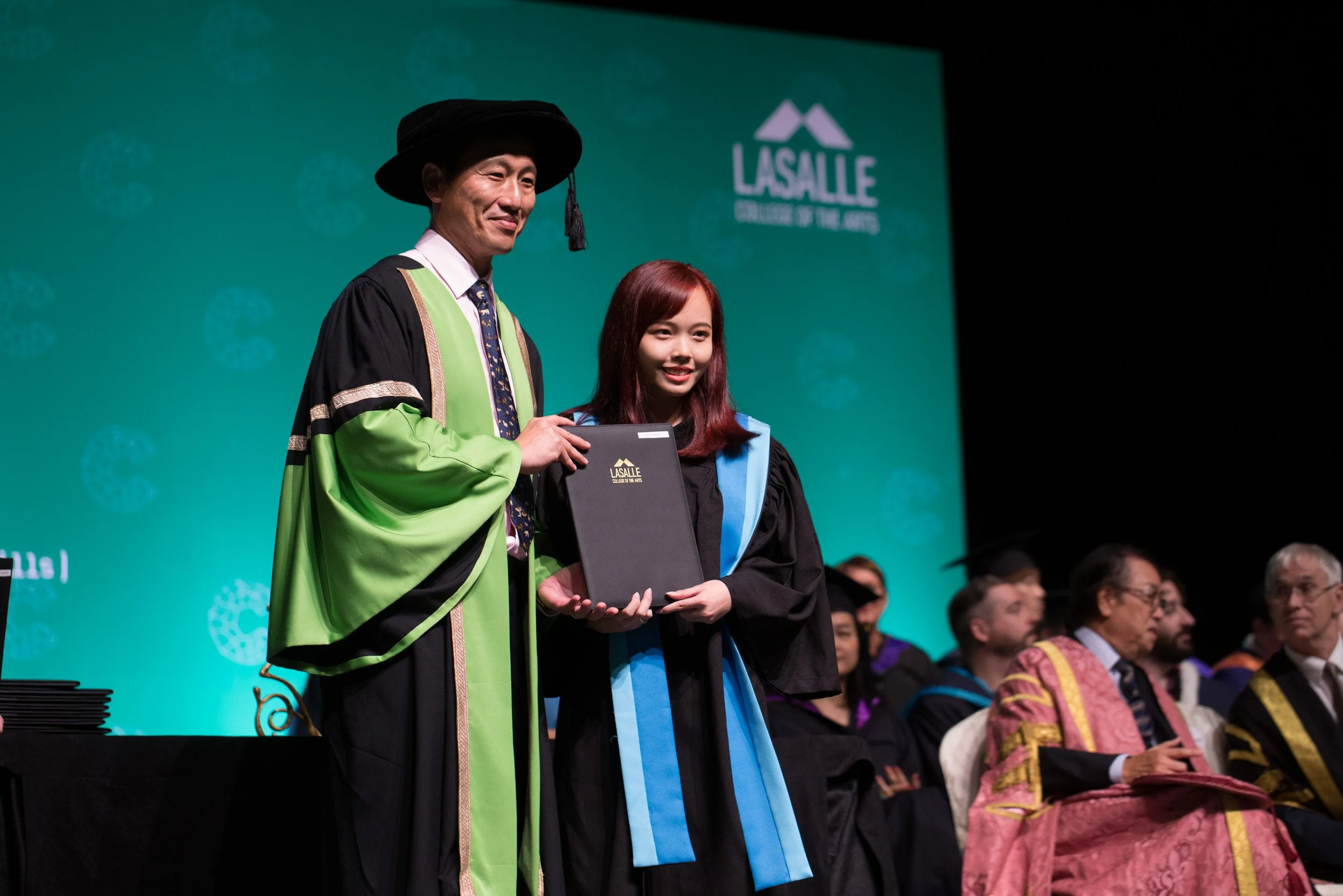  Academic presentation of graduation certificate to a student during the Convocation Ceremony. 