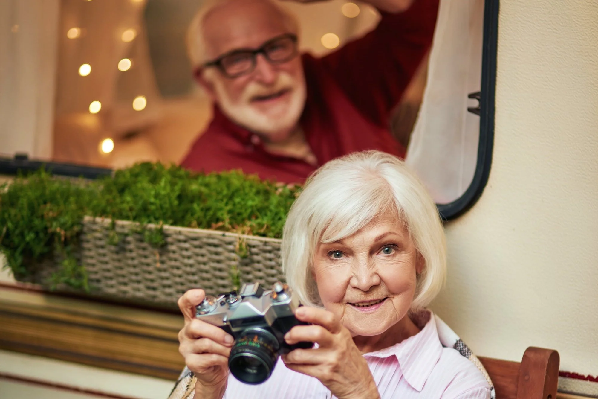 smiling-gray-haired-lady-sitting-on-wooden-chair-w-2021-09-03-20-52-43-utc.jpg