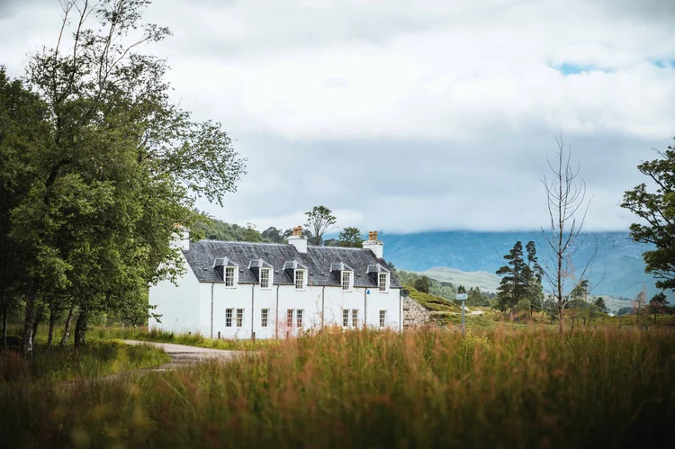 White cottage in Highland landscape