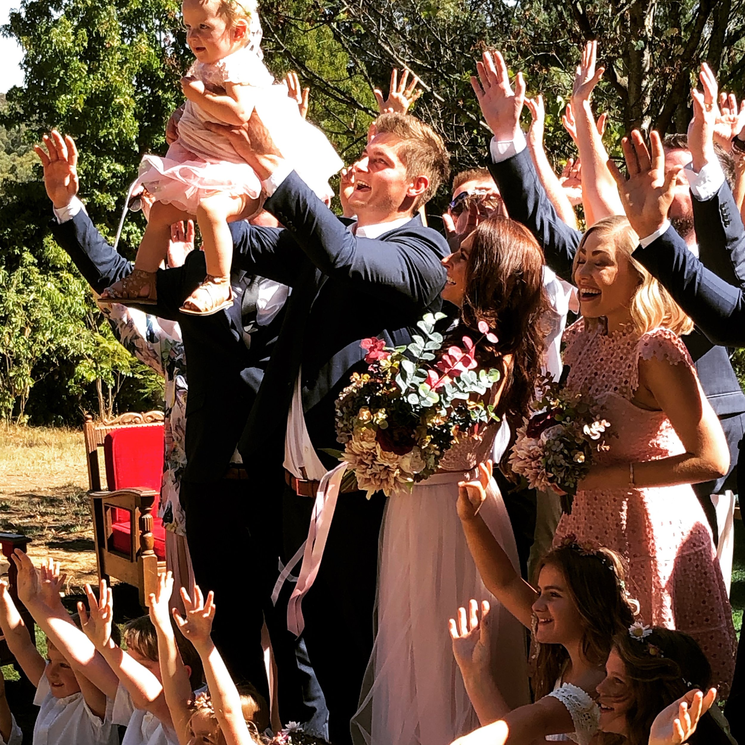  Chelsea and Nick cheering. We’re married! 