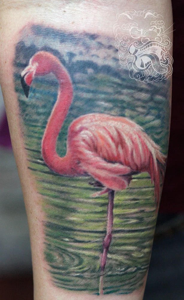 Here is a great example of how an animal tattoo can relate to specific land. This flamingo was done as part of Spanish sleeve.
