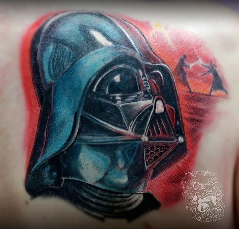 In the picture above, I tattooed Darth Vader to obscure old, unwanted tattoo. Heavy black of Vader's armor serves correctly for this purpose.