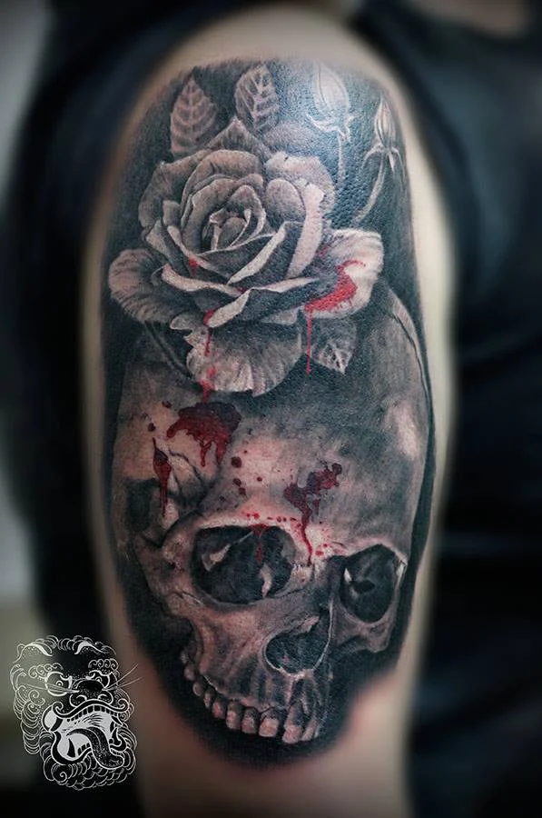 Skulls and roses tattoo.