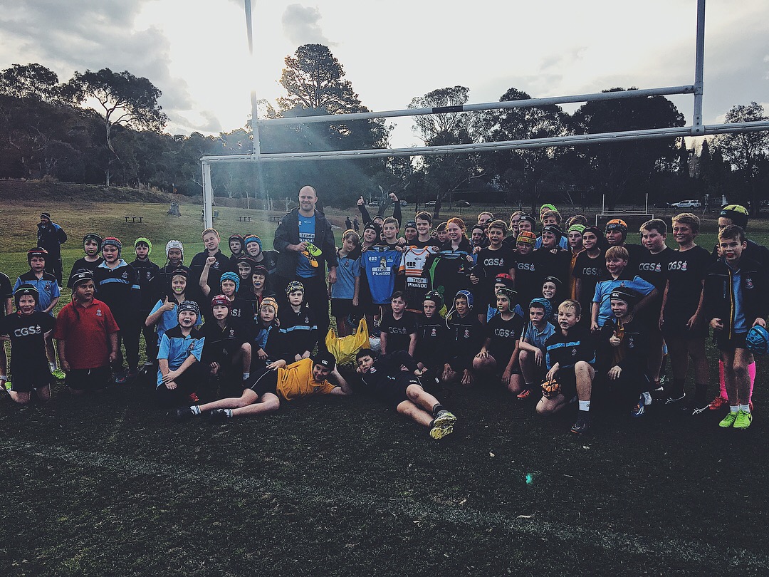 Young Harry and boys From year 5 Canberra Grammar School kindly collecting/donating boxes of boots which will be shipped to Tonga on our next trip! Youth are our future!!