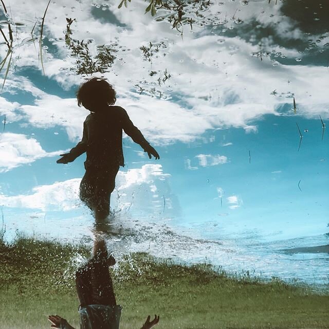I saw a boy in the clouds today. With the whole earth at his fingertips. #puddles #perspective