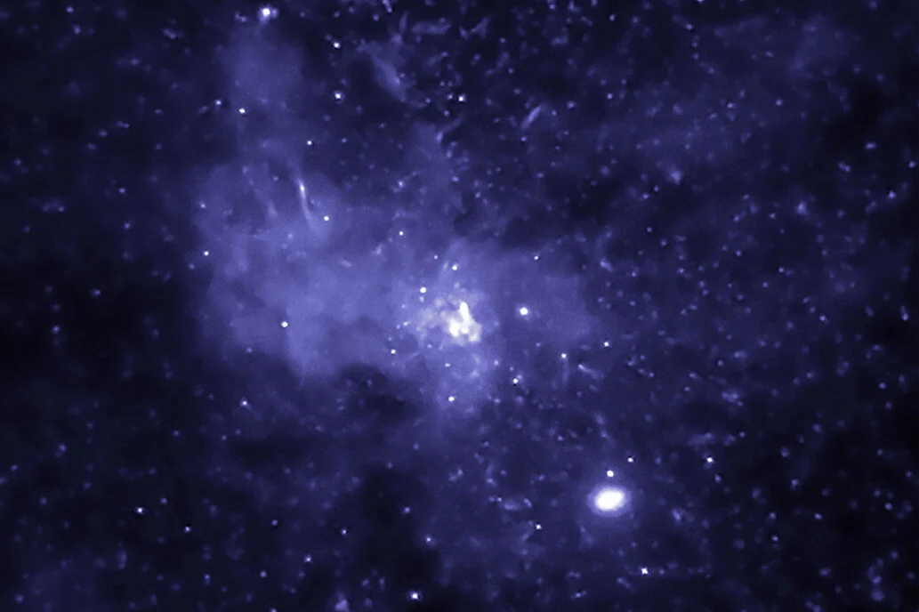 Astronomers have discovered evidence for thousands of black holes located near the center of our Milky Way galaxy using data from NASA's Chandra X-ray Observatory.