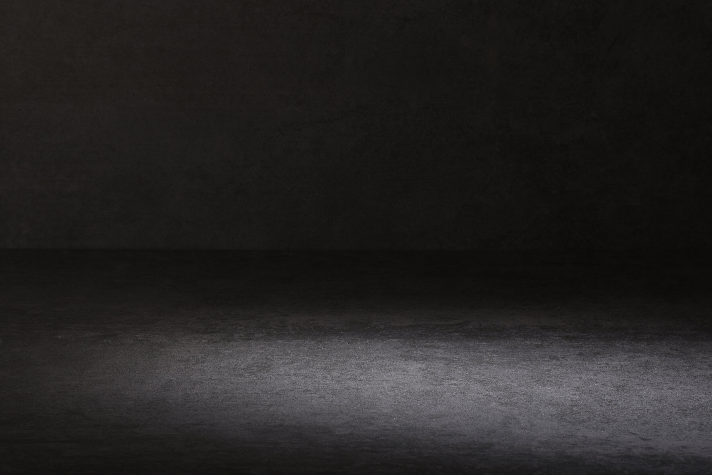 Dark-gray-and-black-stone-background-or-texture-1159872677_6000x4000.jpeg