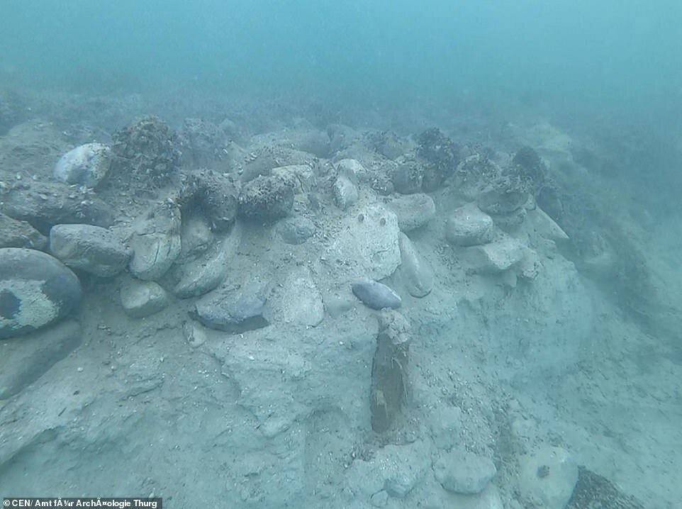   Local media reports that the so-called 'Swiss Stonehenge' (pictured) sits 15feet down at the bottom of Lake Constance and is a Neolithic relic, with stones ranging in size up to around 100 inches wide  