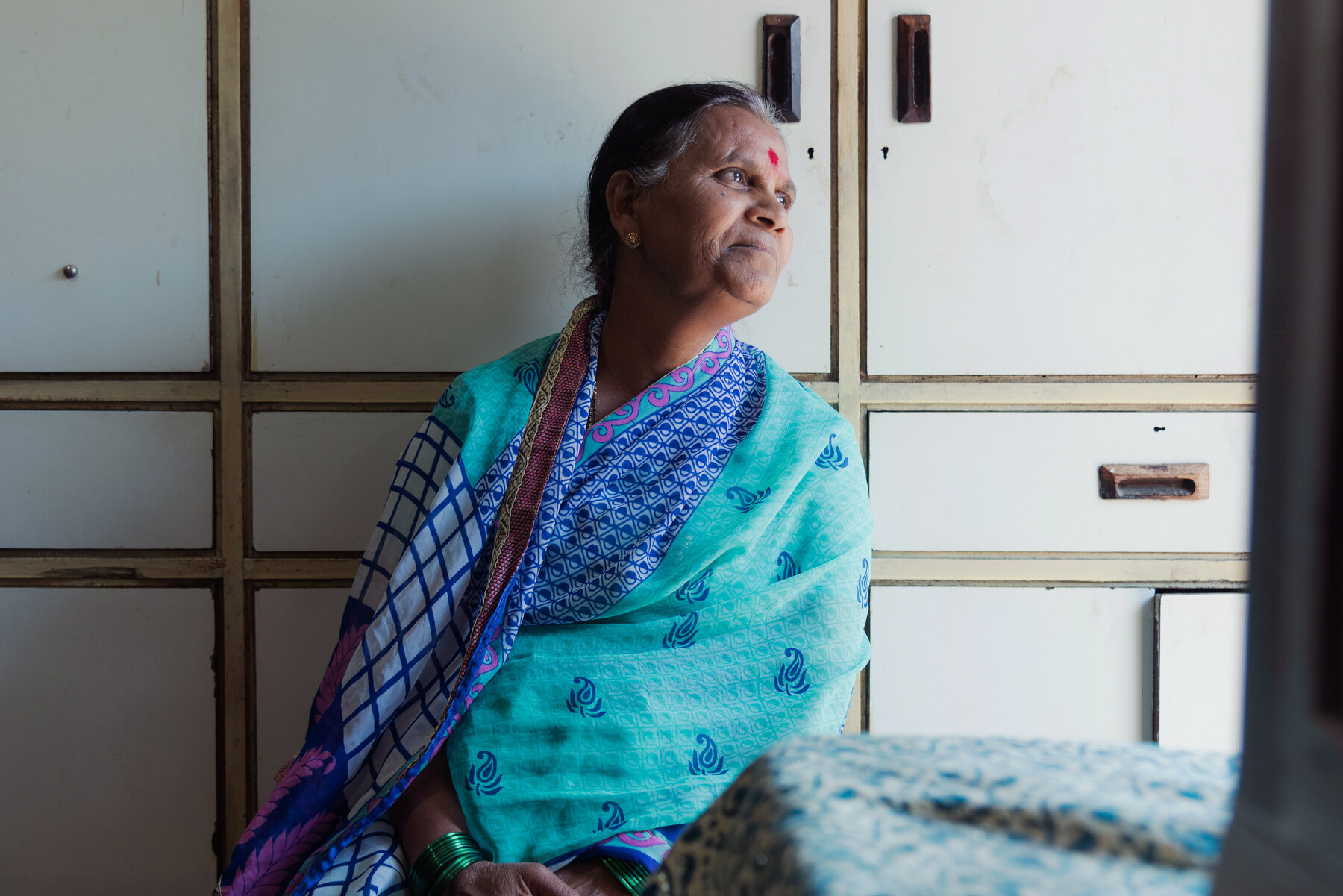  Sharau Shinde, in her 100-year-old house in Bhuinj village. Most of the older women in her village don't know how to read and write and open a bank account. The Mann Deshi Foundation addresses all these issues, which can hinder women from being econ