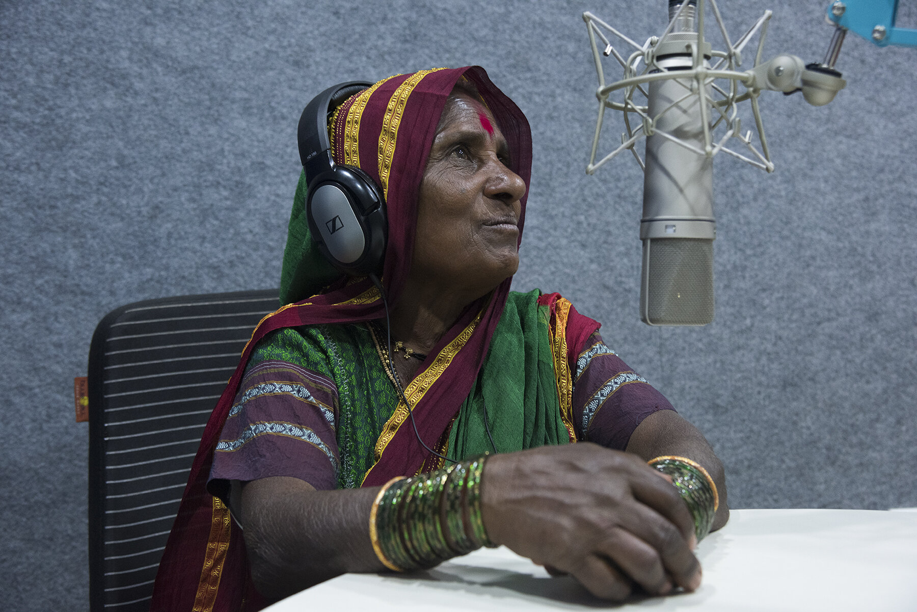  Kirabai Sargar, 60,from Mhaswad, Satara,&nbsp; gets ready for her weekly show on the Mann Deshi local radio station. It was only when she was 50 that, one day, while walking with her son near her house, she saw a notice about a radio show being orga