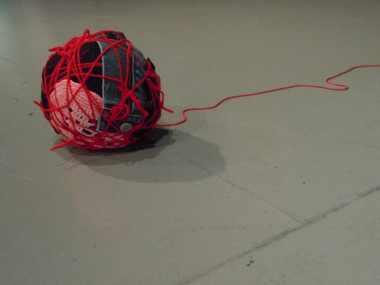 Red Bundle, 2014, Yarn, fabric and clothing scraps