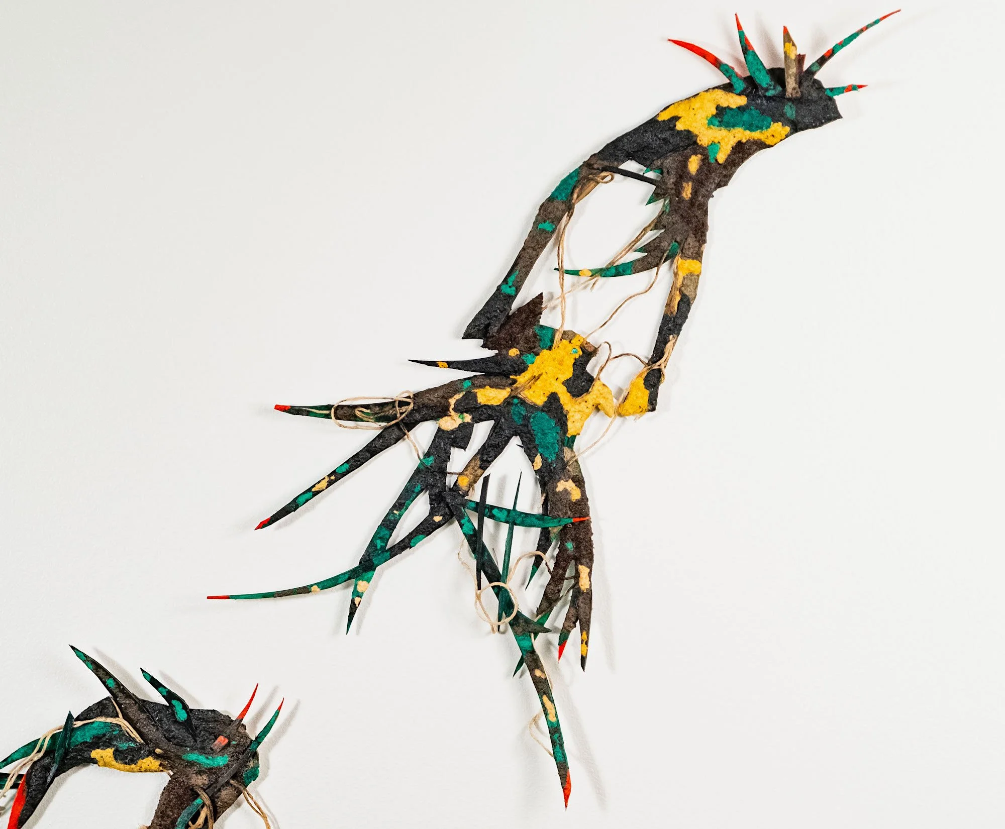 Black brown earth riot and golden, top detail, 2023, paper pulp on foam, stiffened yarn, turmeric, coffee grinds, acrylic. Photo credit: Jacob Sait Ermete