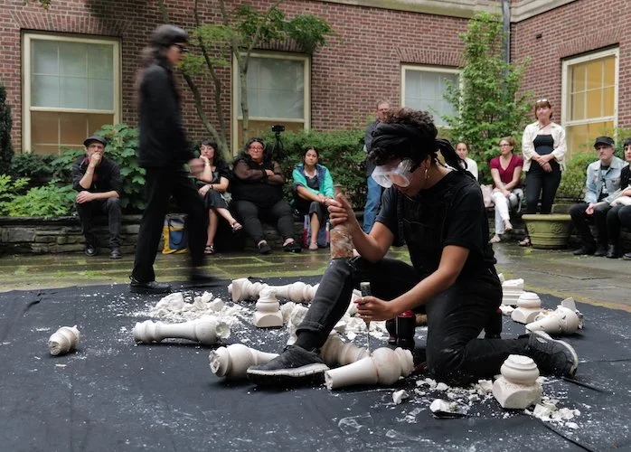   Ecologías Solidarias , 2024. Katreen excavates objects from plaster, Anabel holds steady walking rhythm. Photo by Marta Fodor 