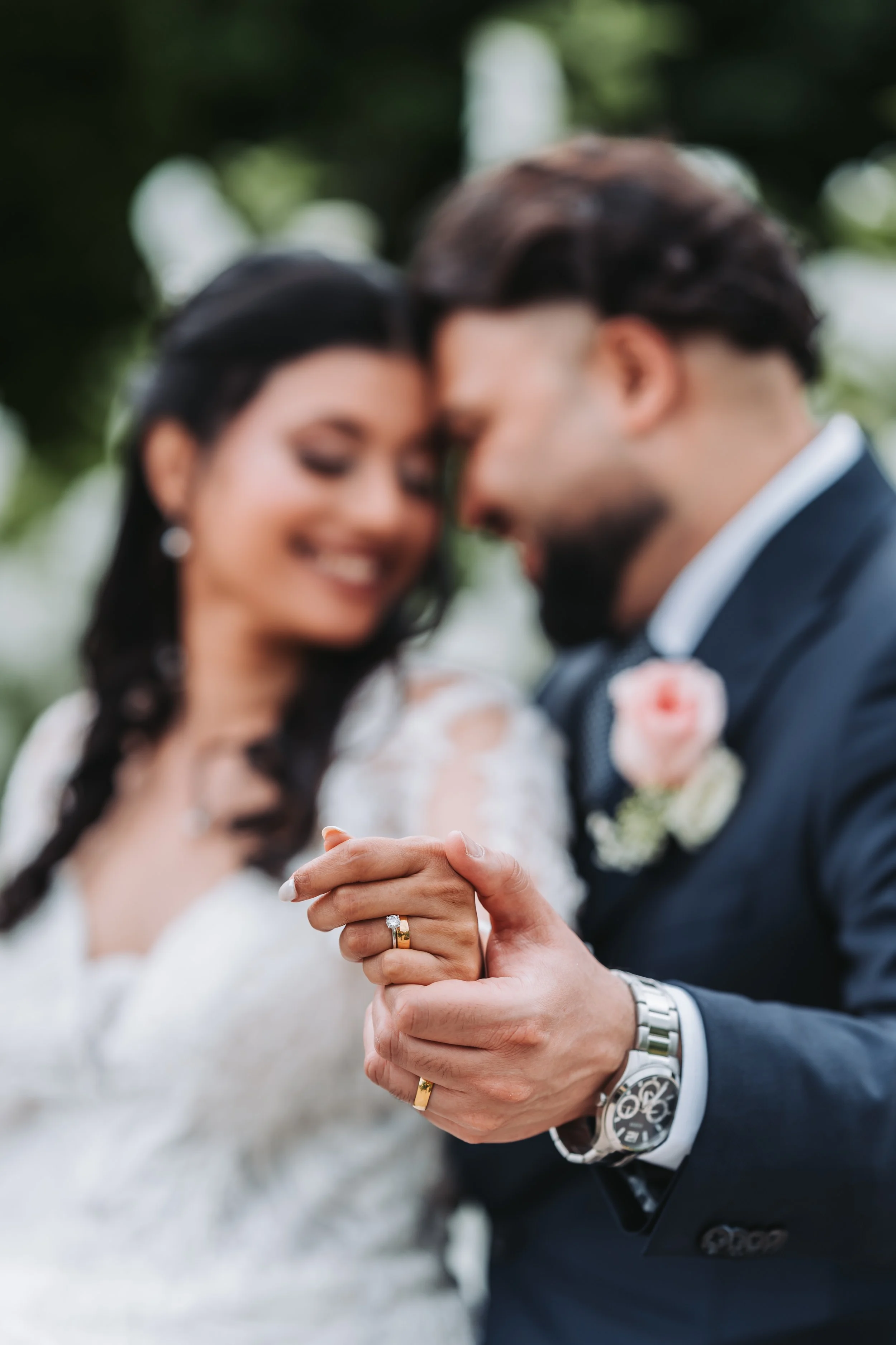 Bride & Groom share an intimate moment at the MacEwan Terrace Garden