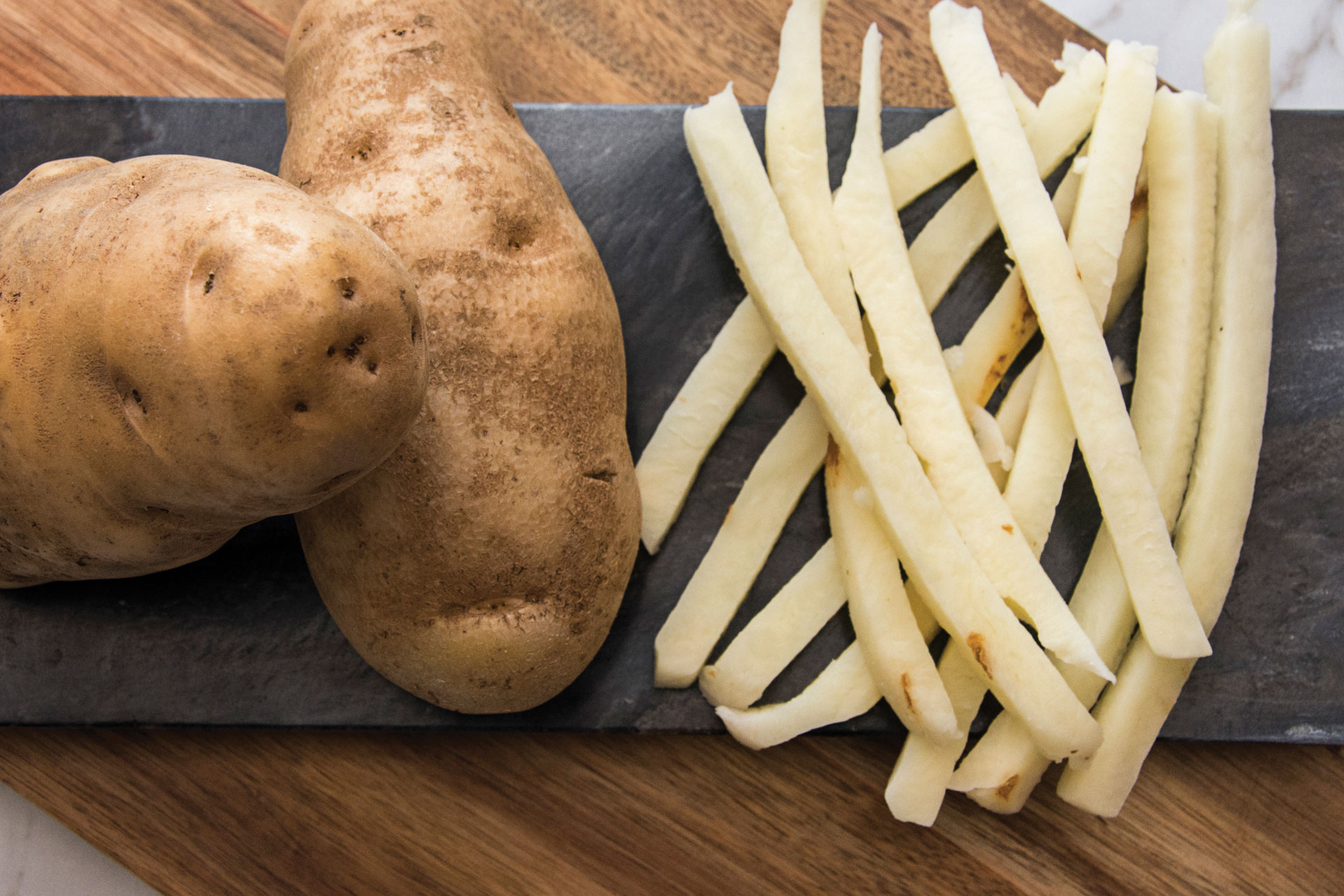  Try our signature   Fresh Cut French Fries    Learn More  