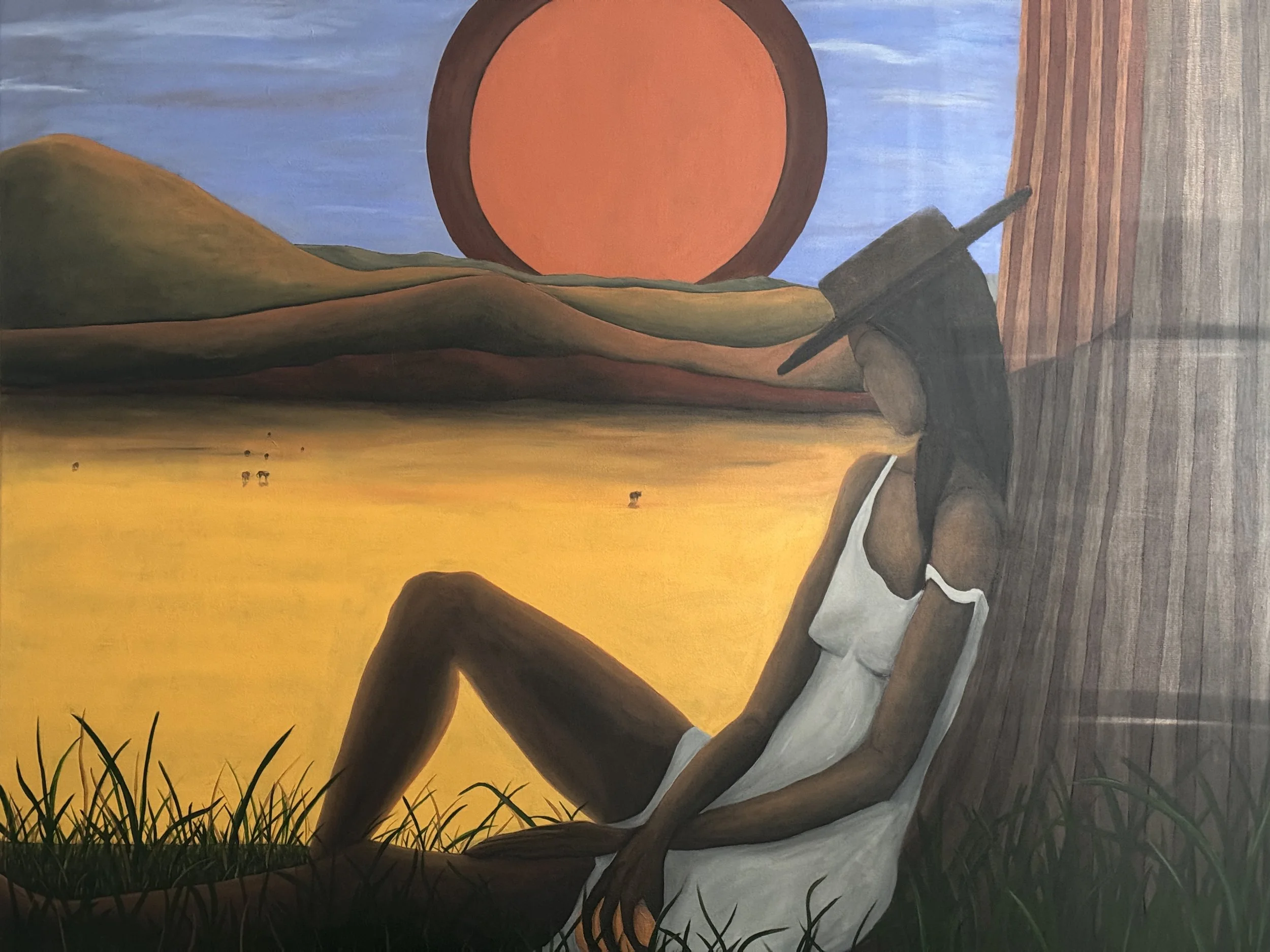 Painting of a person sitting outdoors at sunset, with rolling hills, a large orange sun, and a wooden plank on the ground.