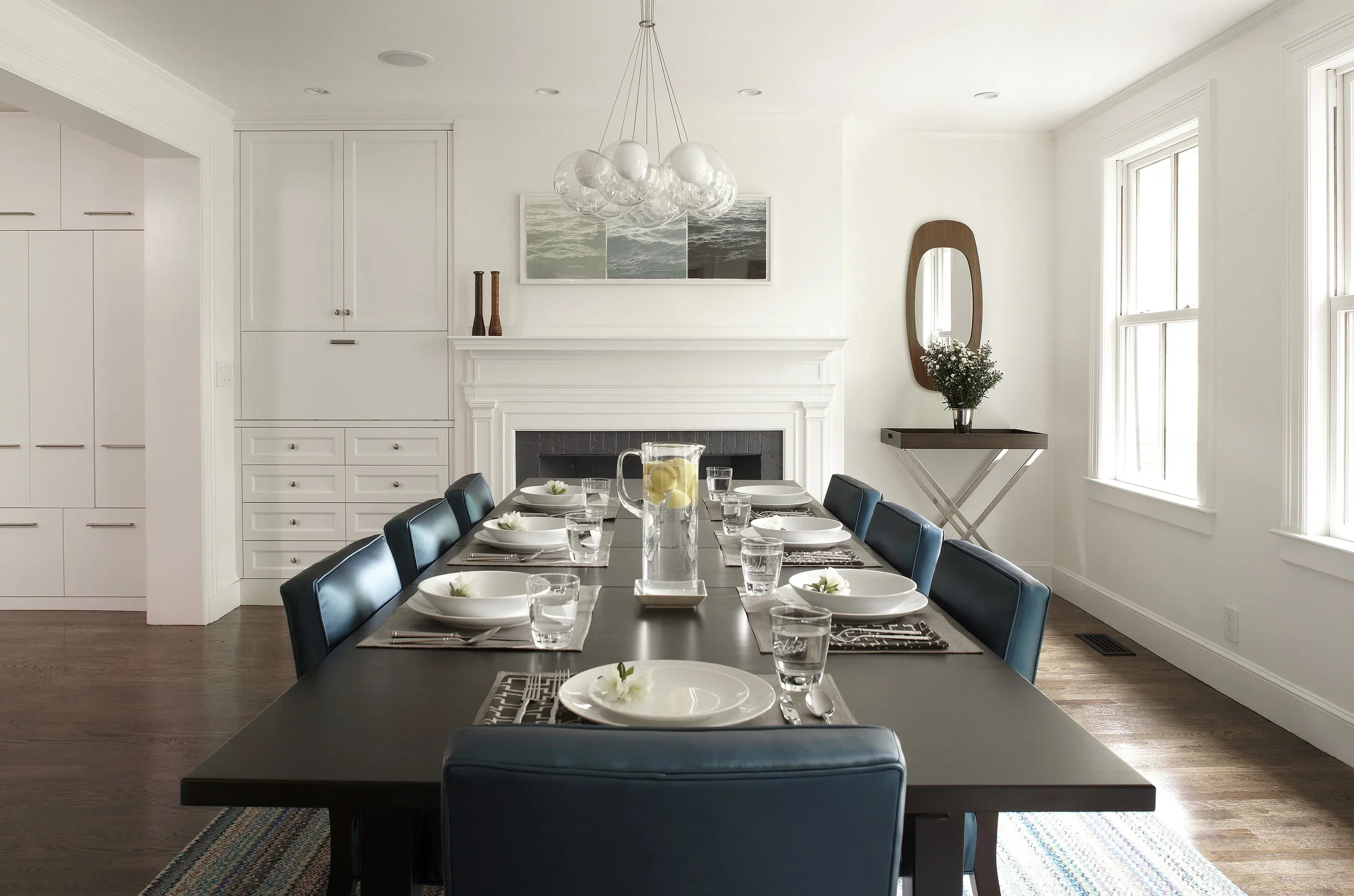 Historic home renovation in Brookline, Massachusetts, with natural light carried between the kitchen and dining room.