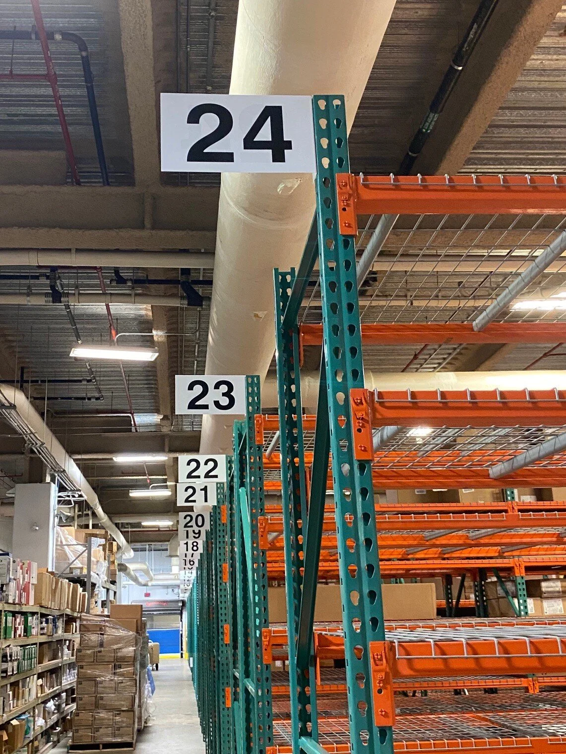 Numbered pallet rack storage bays in Houston warehouse.jpg