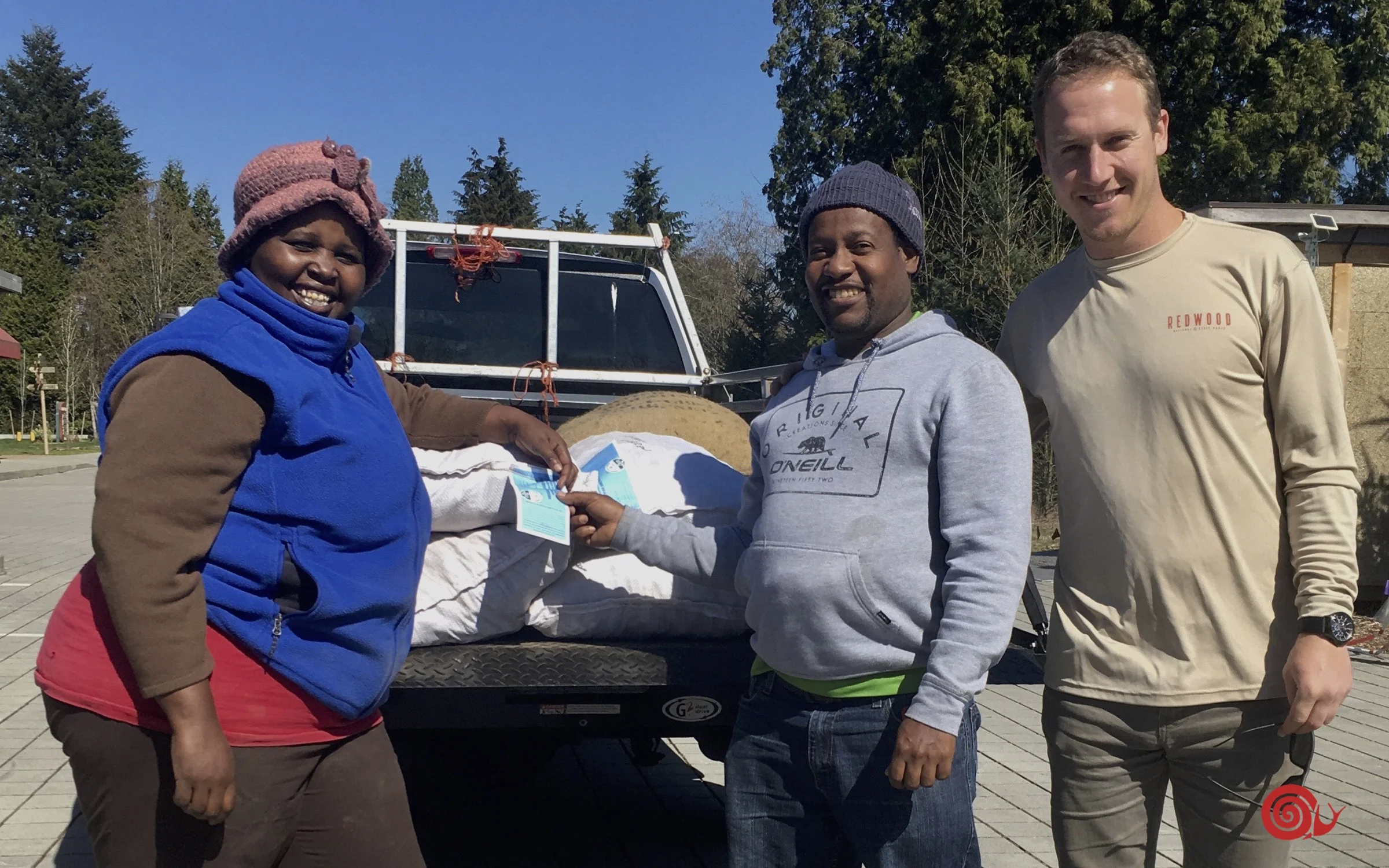 Elizabeth and Francis of Faith Beyond Farm with Slow Food Co-Chair Austin Becker