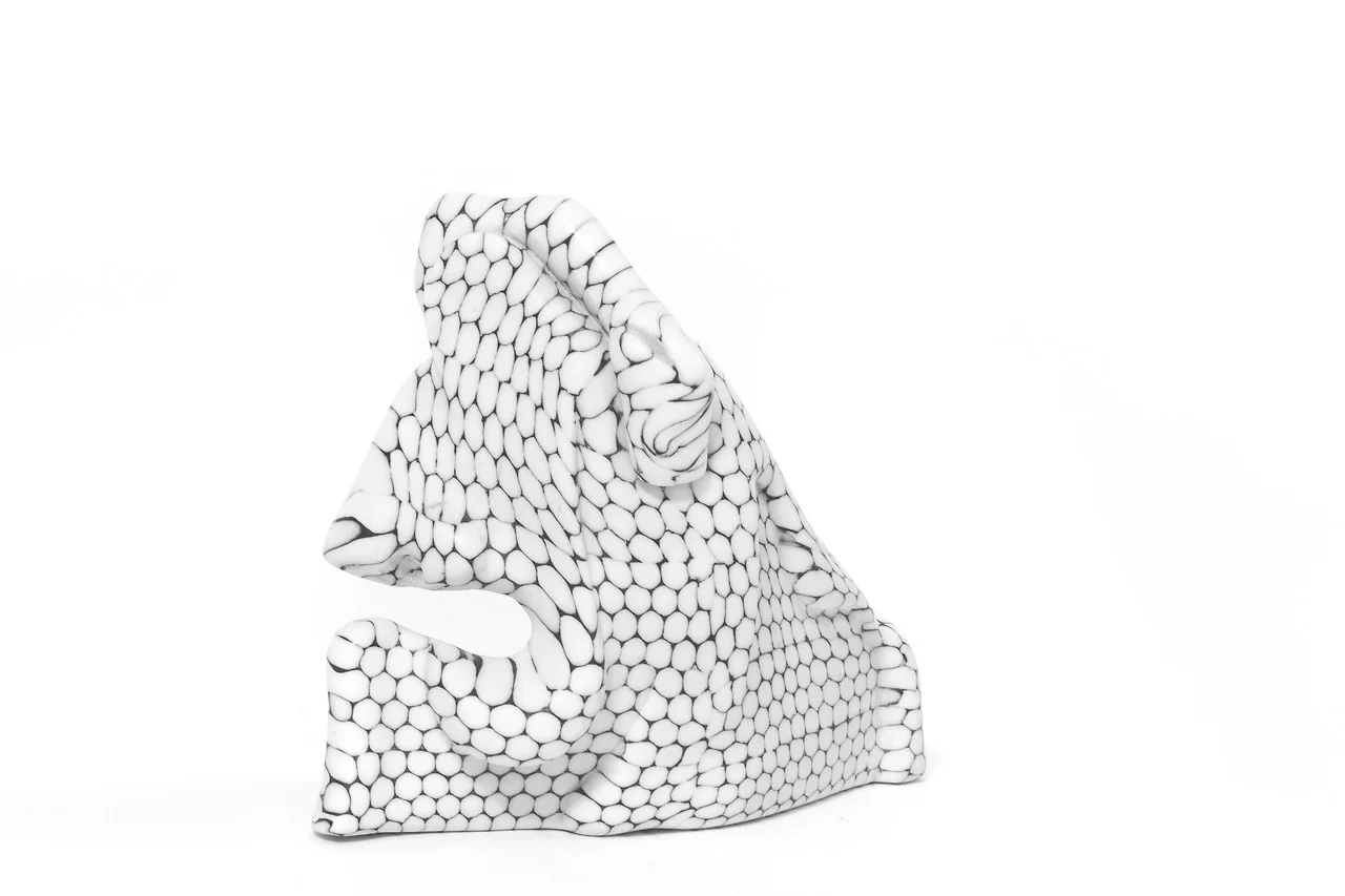 ‘Mehen’ Materials: Porcelain & Solid Fine Silver image courtesy: Egle Pernare & Ilona Broeseliske