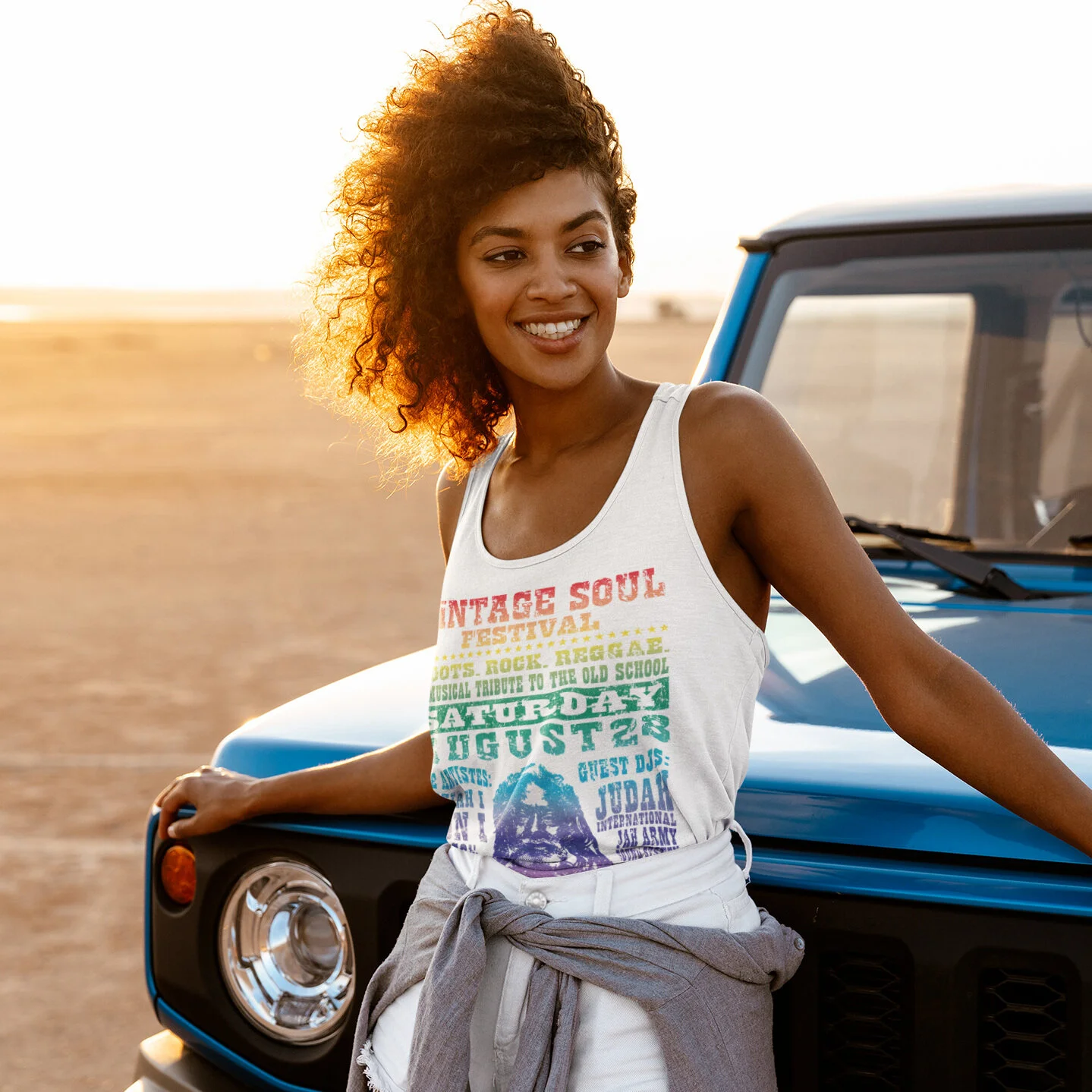tank-top-mockup-of-an-adventurous-woman-posing-by-a-truck-m1340-r-el2.jpg