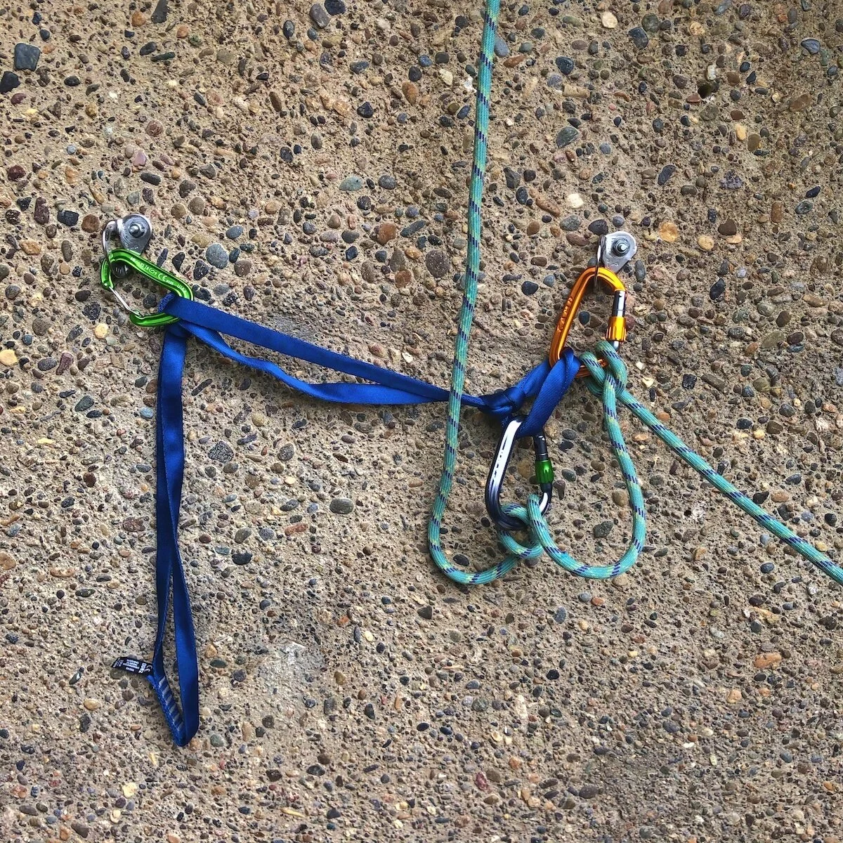 Belaying the leader with a “fixed point” belay — Alpinesavvy