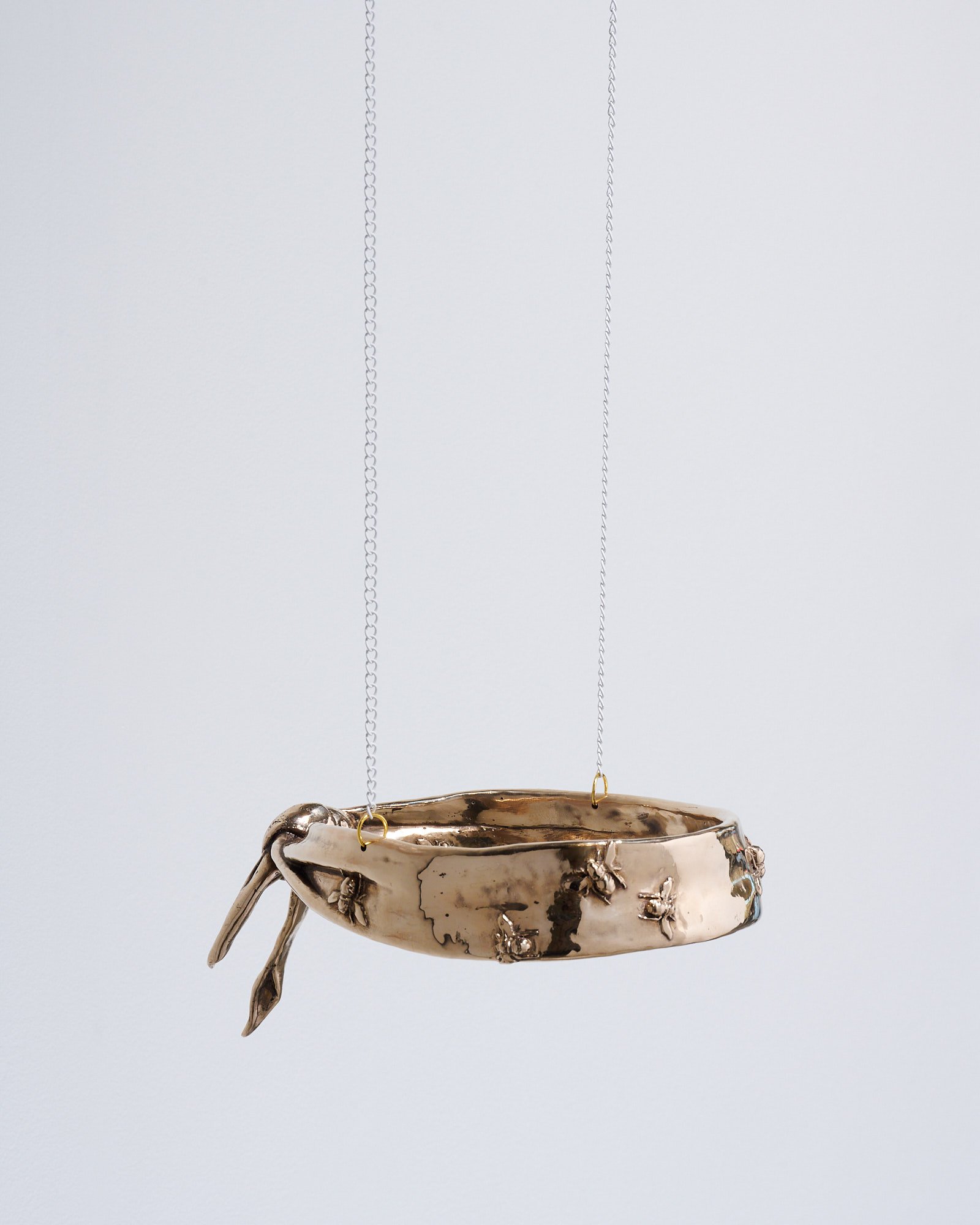 Three Fears (Blindfold) 
2025 
Cast Bronze, chain, charms 
4.5”h x 7”w x 12”d