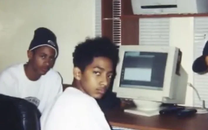 Nipsey Hussle with the computer he built, at age twelve.