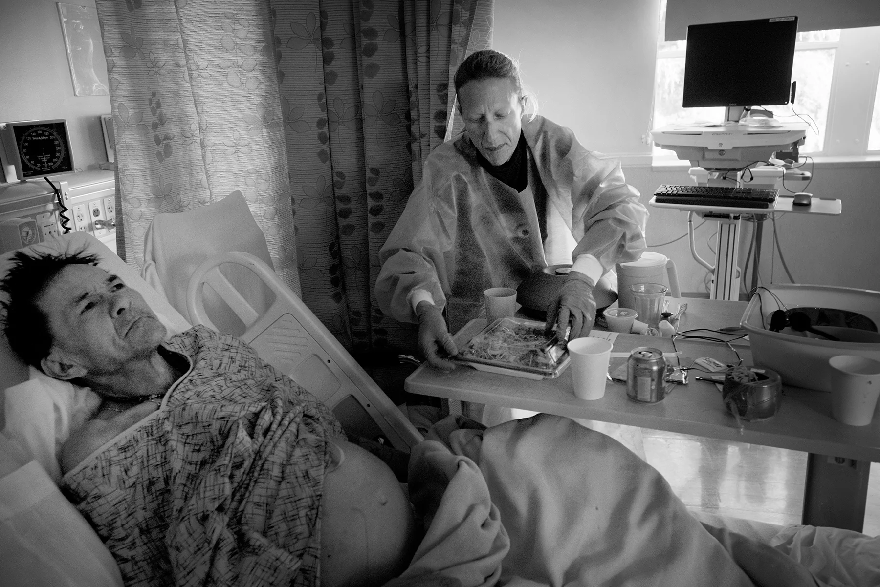 Michelle delivers takeout Chinese food to comfort a fellow homeless person who is dying of cancer at Memorial Hospital. May 19, 2017