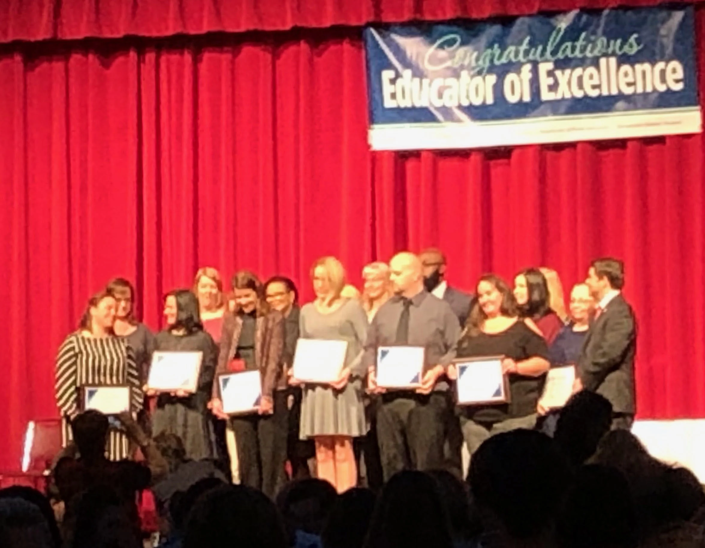 Front Row, Fourth from the Left: Heather Parker, EC Teacher of Excellence, recognized among others for her accomplishment.
