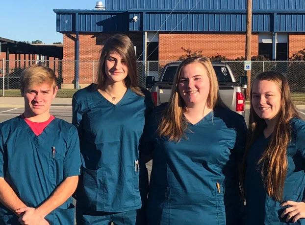 Pictured left-to-right: Tyler Weaver, Sarah Robbins, Lauren Eaker, and Taylor Packer