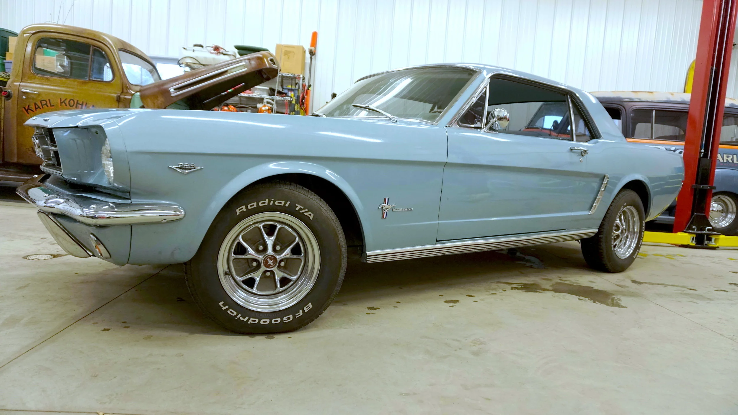 mustang in garage before small.jpeg