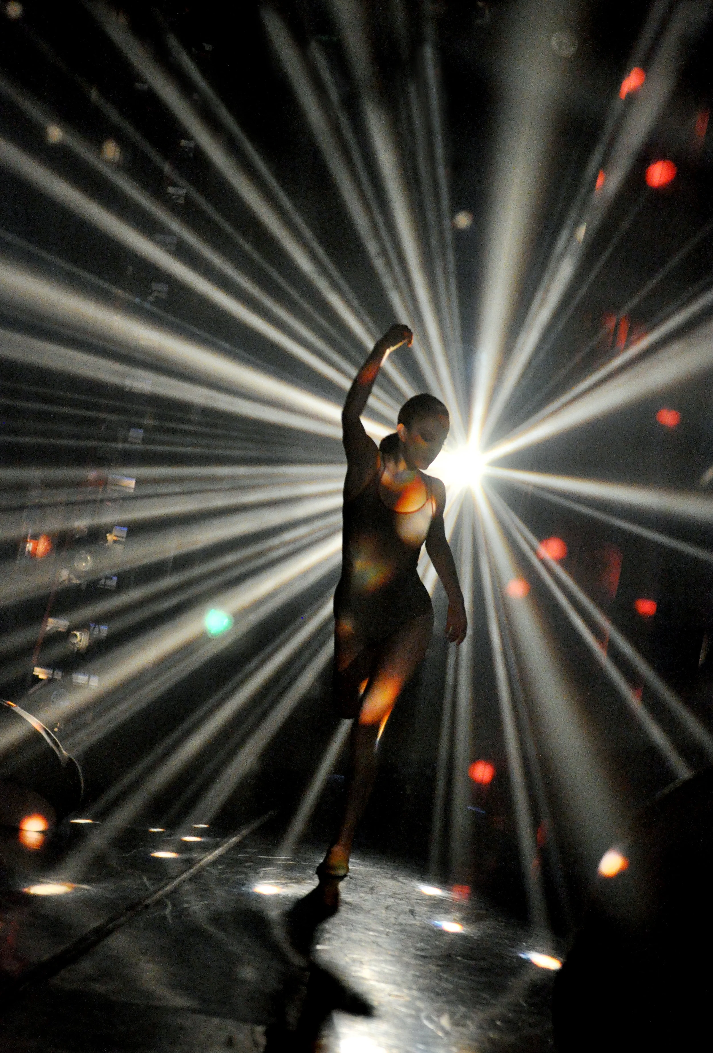 Alessandra Ball in Dekkers’ Milieu, lighting design by David Robertson, photo by Natalia Perez