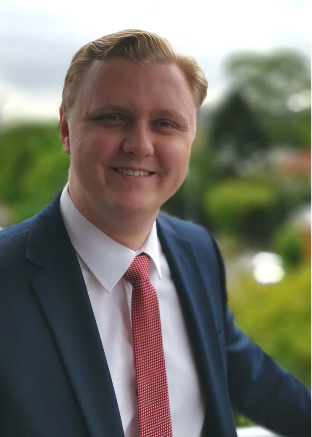 Qld - Thomas Wealleans Profile Headshot.png