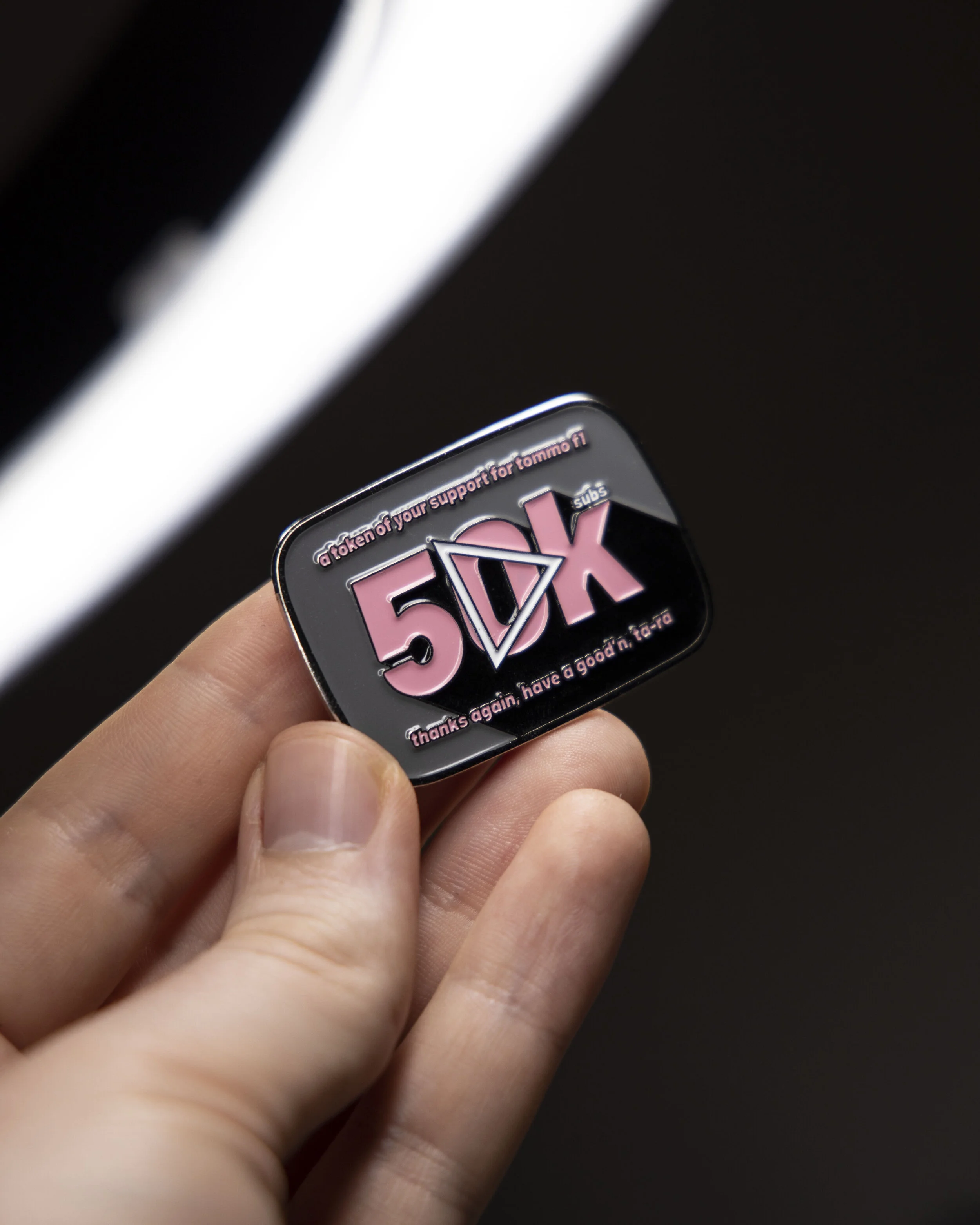 50K Tommo F1 Subscriber Pin